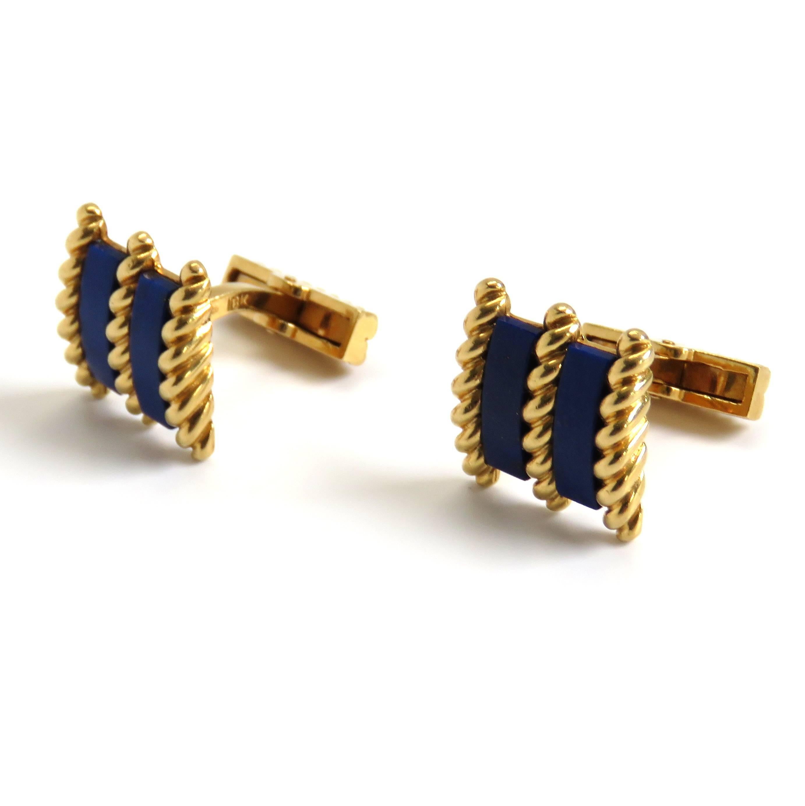 A pair of 18k yellow gold cufflinks set with lapis.  The cufflinks measure 17mm x 16mm and weigh 20.3 grams.  Marked: Tiffany & co; Co,18k.
