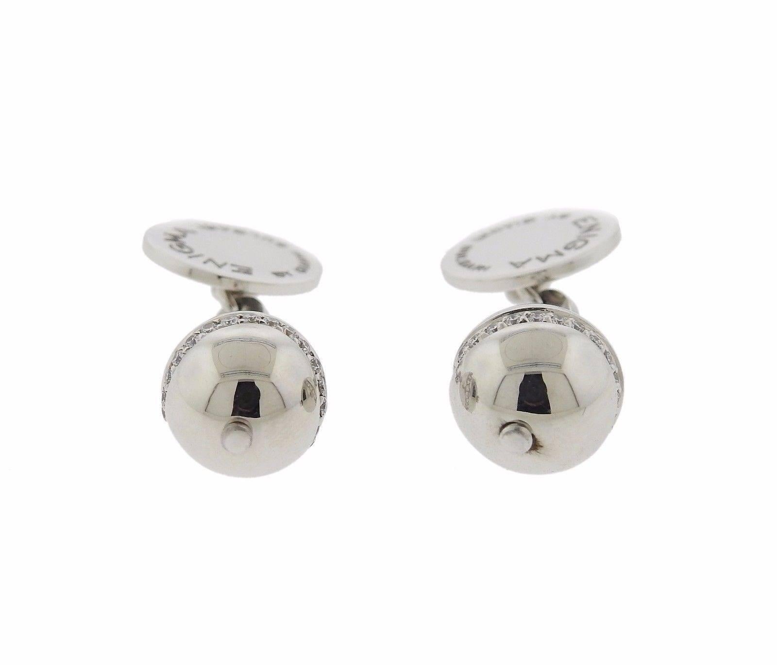A pair of 18k white gold cufflinks set with approximately 0.36 ctw of G/VS diamonds.  The cufflinks balls measure 10.5mm in diameter and the backs are 12mm.  The weight of the pair is 12.4 grams.  Marked:	Enigma by Gianni Bulgari, 750, 1498AR.