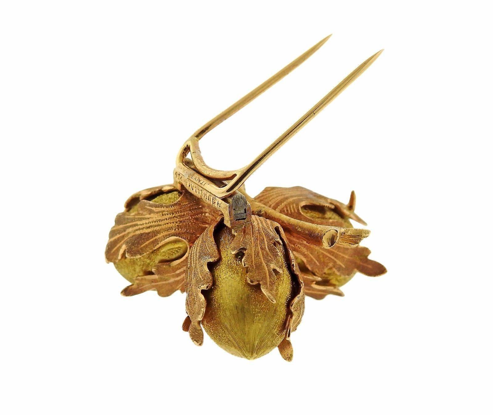 An 18k yellow and rose gold brooch by Buccellati.  The brooch measures 33mm x 35mm and weighs 25.7 grams.  Marked: Italy, Buccellati, 750.
