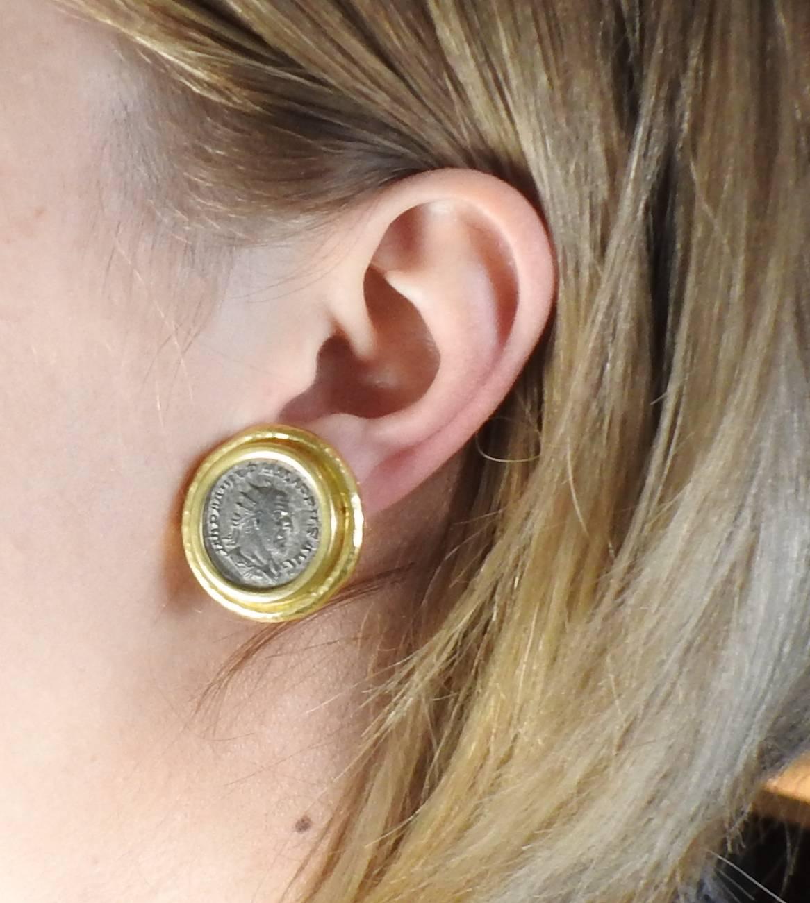 A pair of large 18k yellow gold earrings, crafted by Elizabeth Locke, set with coins. Earrings are 28mm in diameter, with collapsible posts. Marked with Locke mark, 18k. Weight of the earrings - 29.5 grams