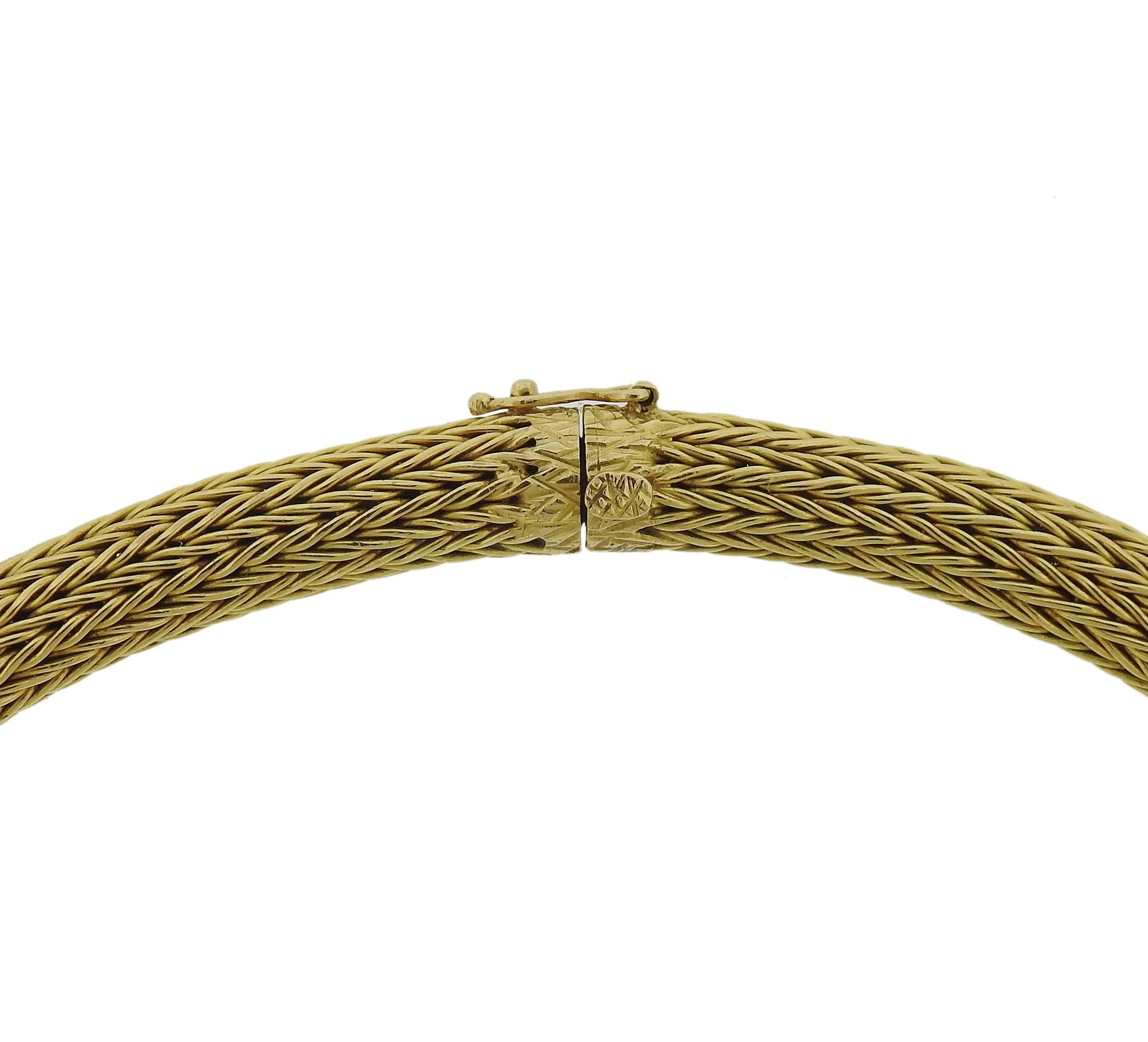 An 18k yellow gold necklace, crafted by Greek designer Ilias Lalaounis, measuring 15 1/4