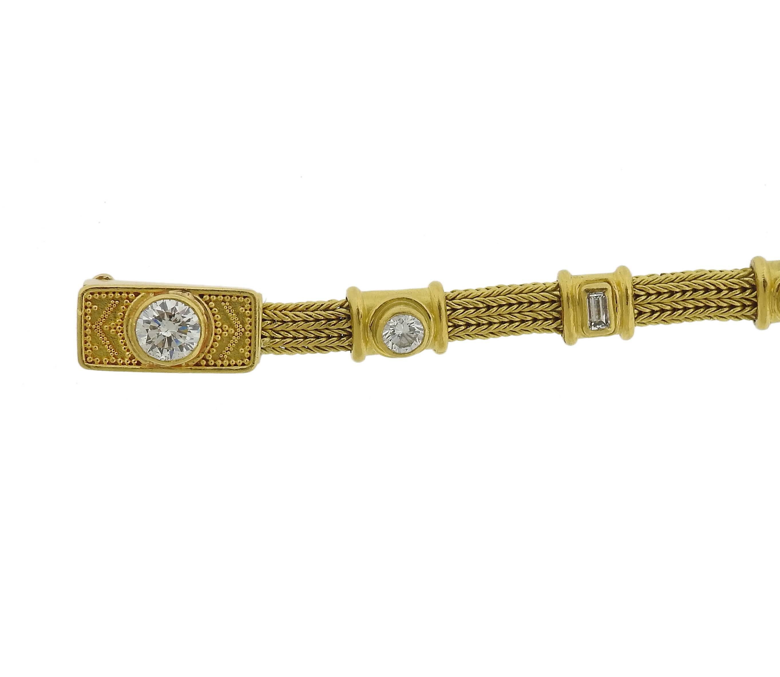 An 18k and 22k yellow gold bracelet, crafted by Bikakis & Johns. Granulation, repoussée, filigree and chain making are all time-honored jewelry making techniques that continue to live through the elegant work of master goldsmiths and jewelry