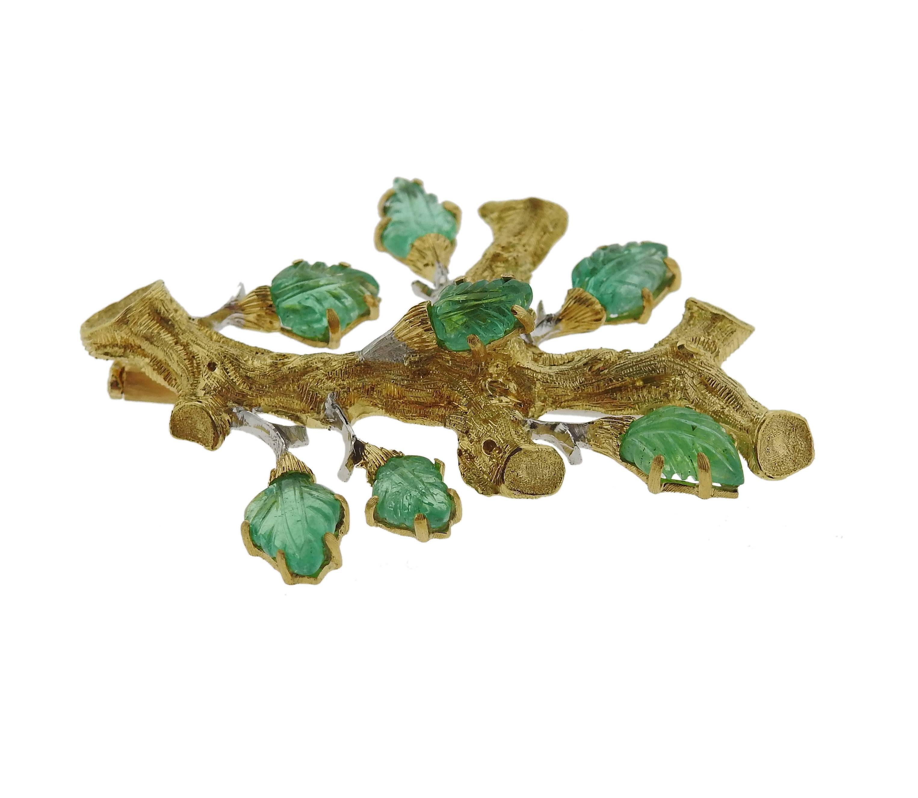 18k yellow gold brooch, crafted by Buccellati, featuring carved emeralds. Brooch is 50mm x 32mm and weighs 20.4 grams. Marked: Buccellati 18k Italy L3032.
Retail price $19630