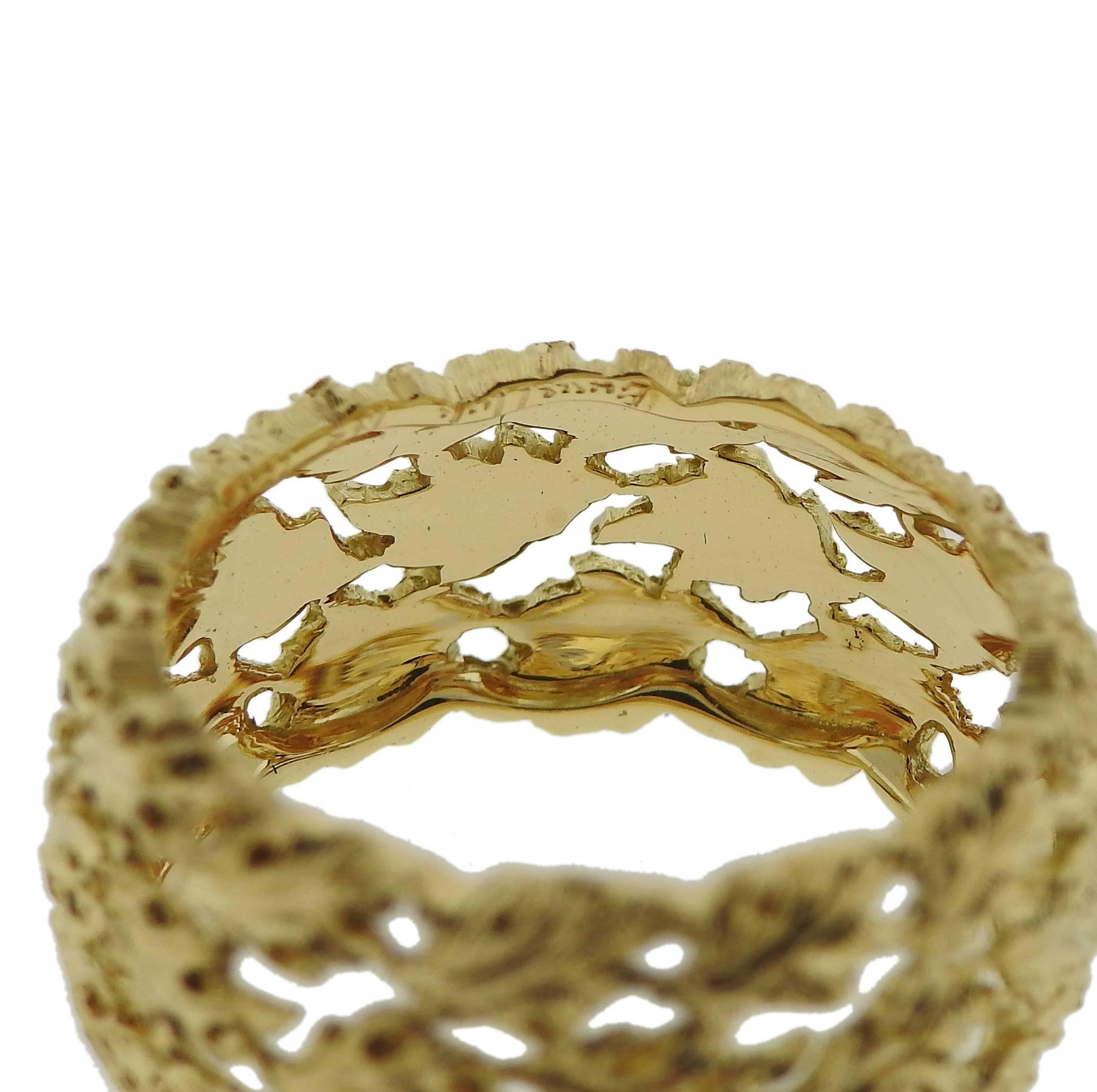18k yellow gold leaf motif band ring, crafted by Buccellati. Ring size 5 1/2, ring is 9mm wide  and weighs 4.9 grams. Marked: T6511, Italy 18k,  Buccellati . 

