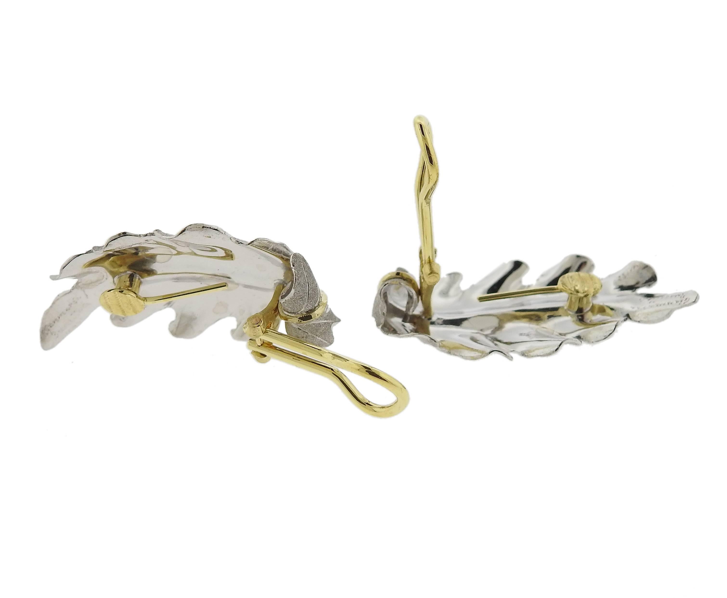 Pair of large leaf earrings, crafted by Buccellati, set in sterling silver and 18k yellow gold. Earrings are 35mm x 20mm  and weigh 10.3 grams. Marked: Gianmaria Buccellati, Italy, 925, 18k , W1580.
Retail 5330