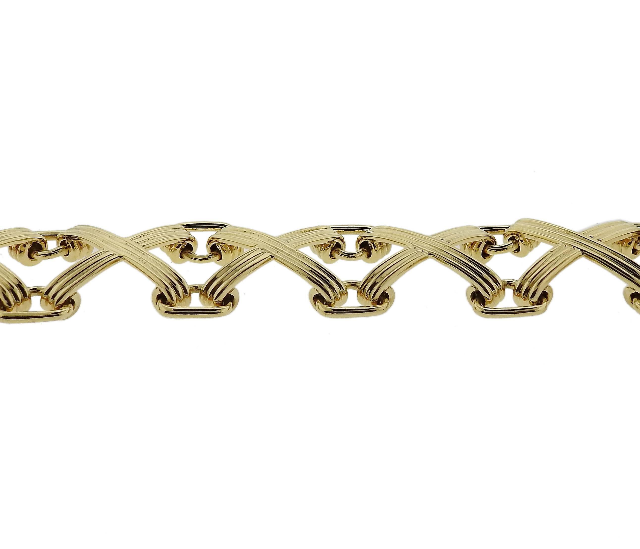 An 18k yellow gold bracelet, crafted by Jean Schlumberger for Tiffany & Co. Bracelet is 7 1/4" long and 21mm wide , weighs 47.6 grams. Marked: Tiffany & Co , Schlumberger 750. Current retail $8500