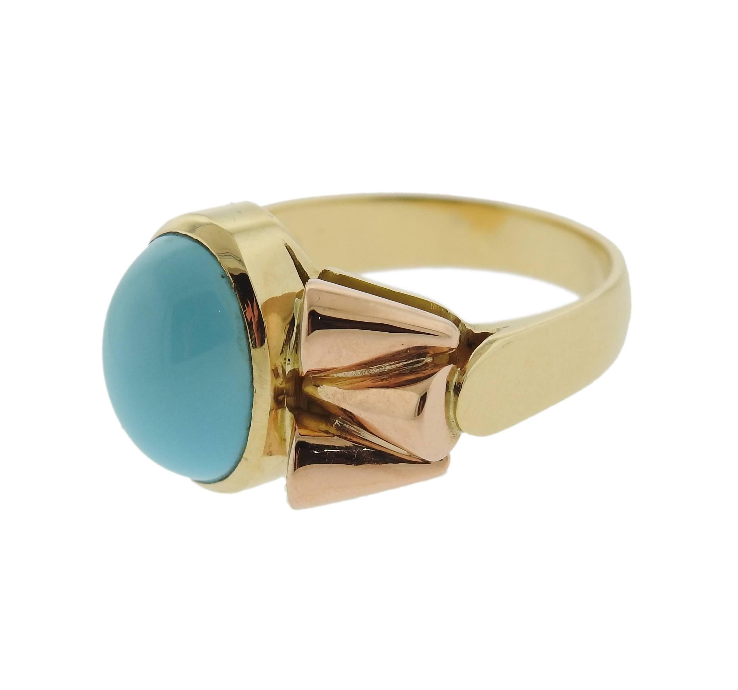 An 18k gold ring crafted by Giorgio Facchini featuring turquoise cabochon. Ring is a size 7 1/2, ring top is 13.6mm wide. Marked G.Facchini signature, 750. Weight is 10.8 grams.