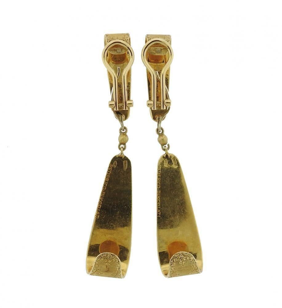 A pair of 18k yellow gold earrings by Federico Buccellati.  The earrings measure 64mm long with drops and 23mm without. The weight of the pair is 20 grams.  Marked: 750, Federico Buccellati.
