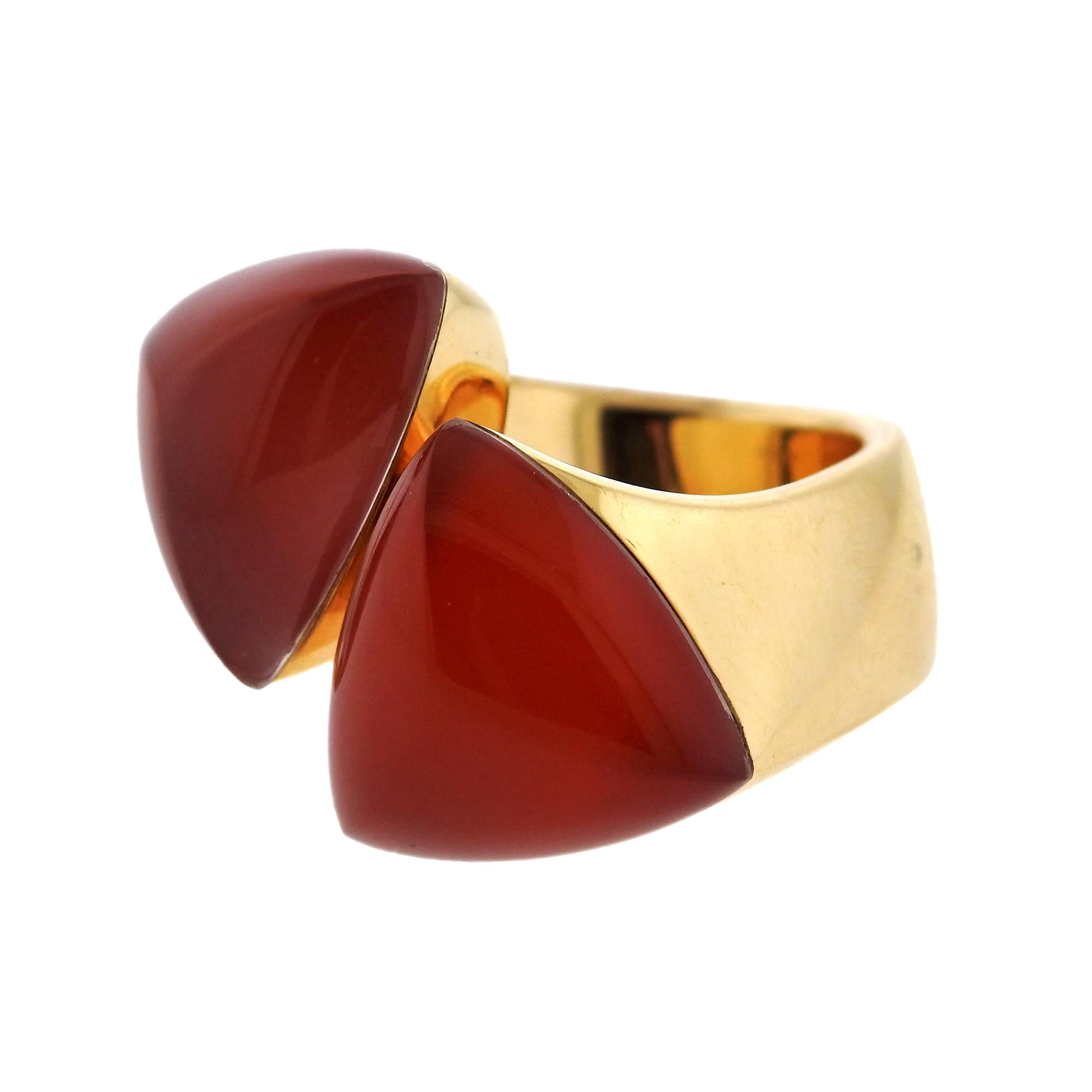 Beautiful large 18k gold ring, crafted by Vhernier for Freccia collection, set with carnelian and rock crystal. Ring is a size 6 1/2, ring top is 24mm x 35mm. Marked:  Vhernier, 30D, 750, 253750. Weight of the piece - 20.8 grams 