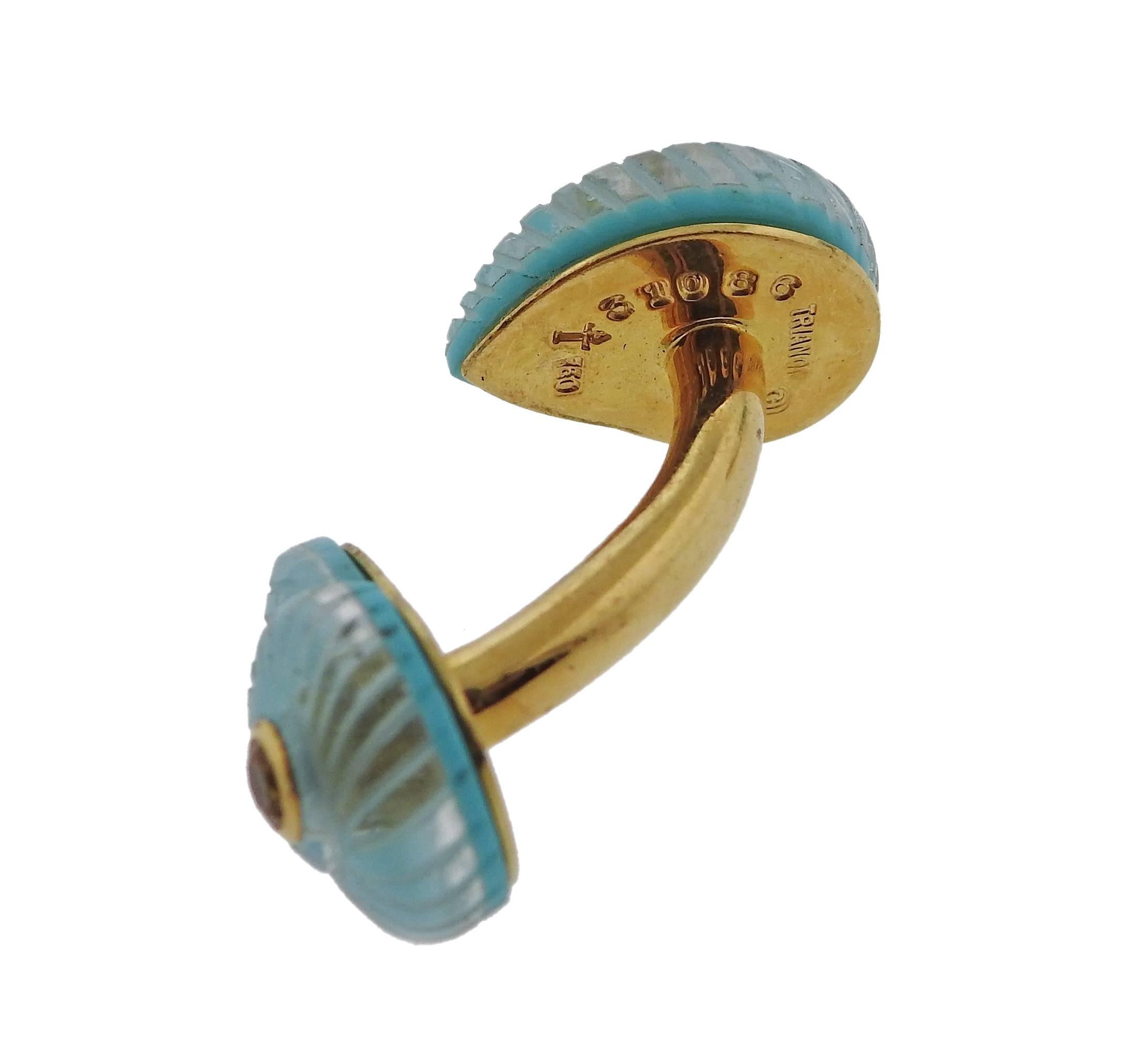 Pair of 18k yellow gold shell motif cufflinks, crafted by Trianon, decorated with carved crystal, backed with turquoise, with a citrine in the center. Cufflink top is 15mm x 11mm , weight - 10.2 grams. Markes: Trianon, 750, 31086.