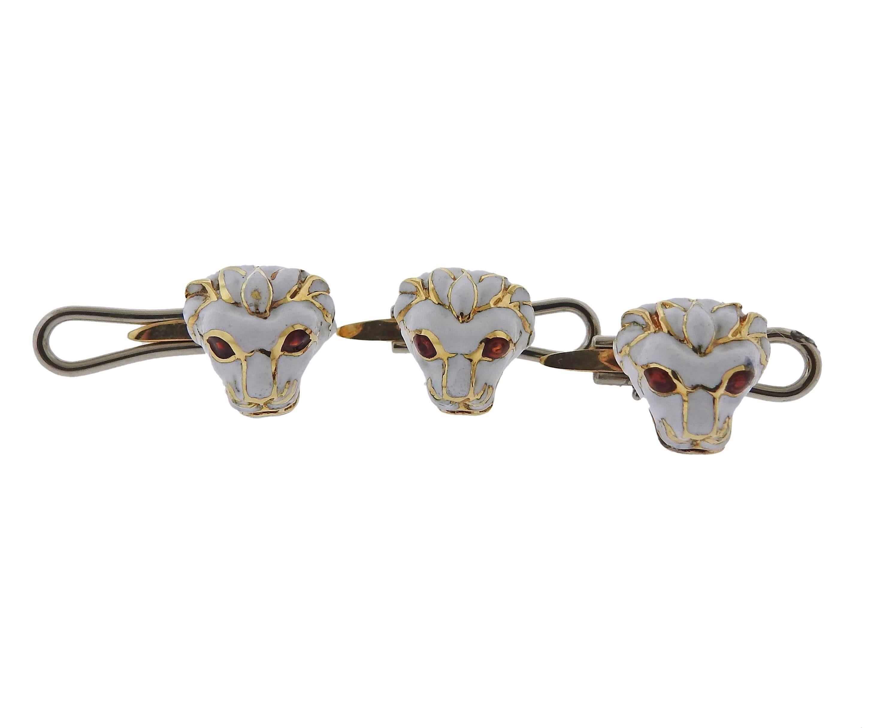 Iconic 18k gold cufflinks and studs set, crafted by David Webb, decorated with enamel, featuring lion heads. Cufflink top is 18mm x 17mm,  stud top - 12mm x 12mm. Marked: Webb 18k. Weight of the set - 38.5 grams 