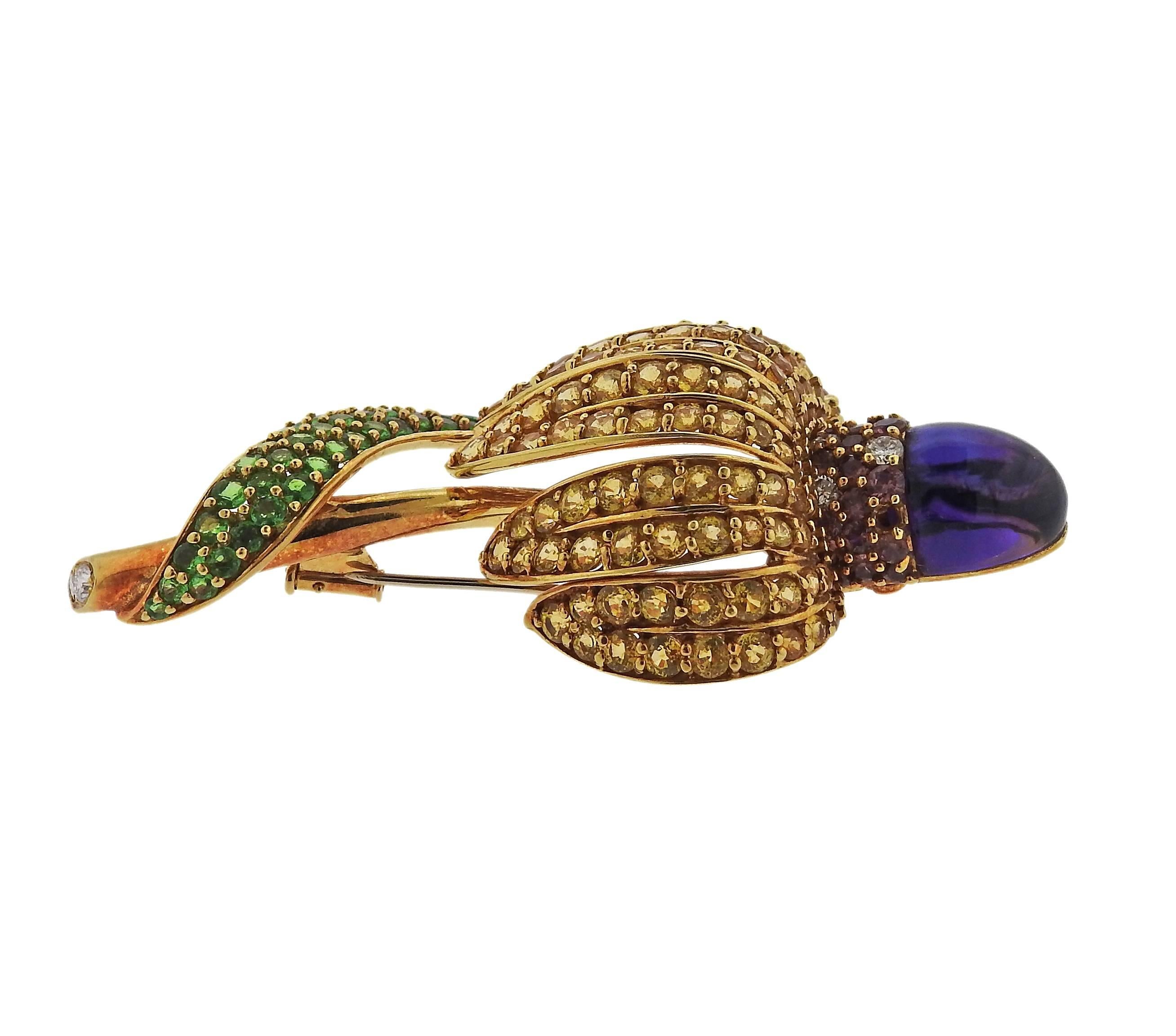 Colorful 18k yellow gold brooch and earrings set, crafted in circa 1983 by Tiffany & Co, decorated with tsavorites, amethyst cabochons, yellow and pink sapphires, approximately 0.60ctw in G/VS diamonds. Brooch is 75mm x 37mm, earrings measure