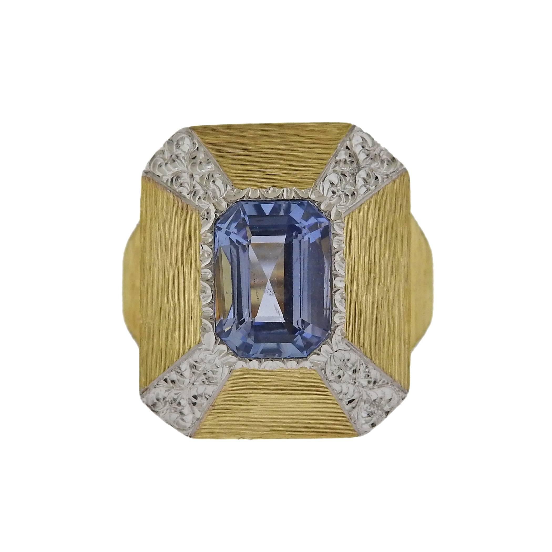 18k gold ring crafted by Buccellati featuring a 3.70ct sapphire center. Ring is a size 6, ring top is 21mm x 18mm. Marked T6526, Ialy, 18k, Buccellati . Weight is 10.3 grams. Comes with Buccellati paperwork and retails for $29,500.