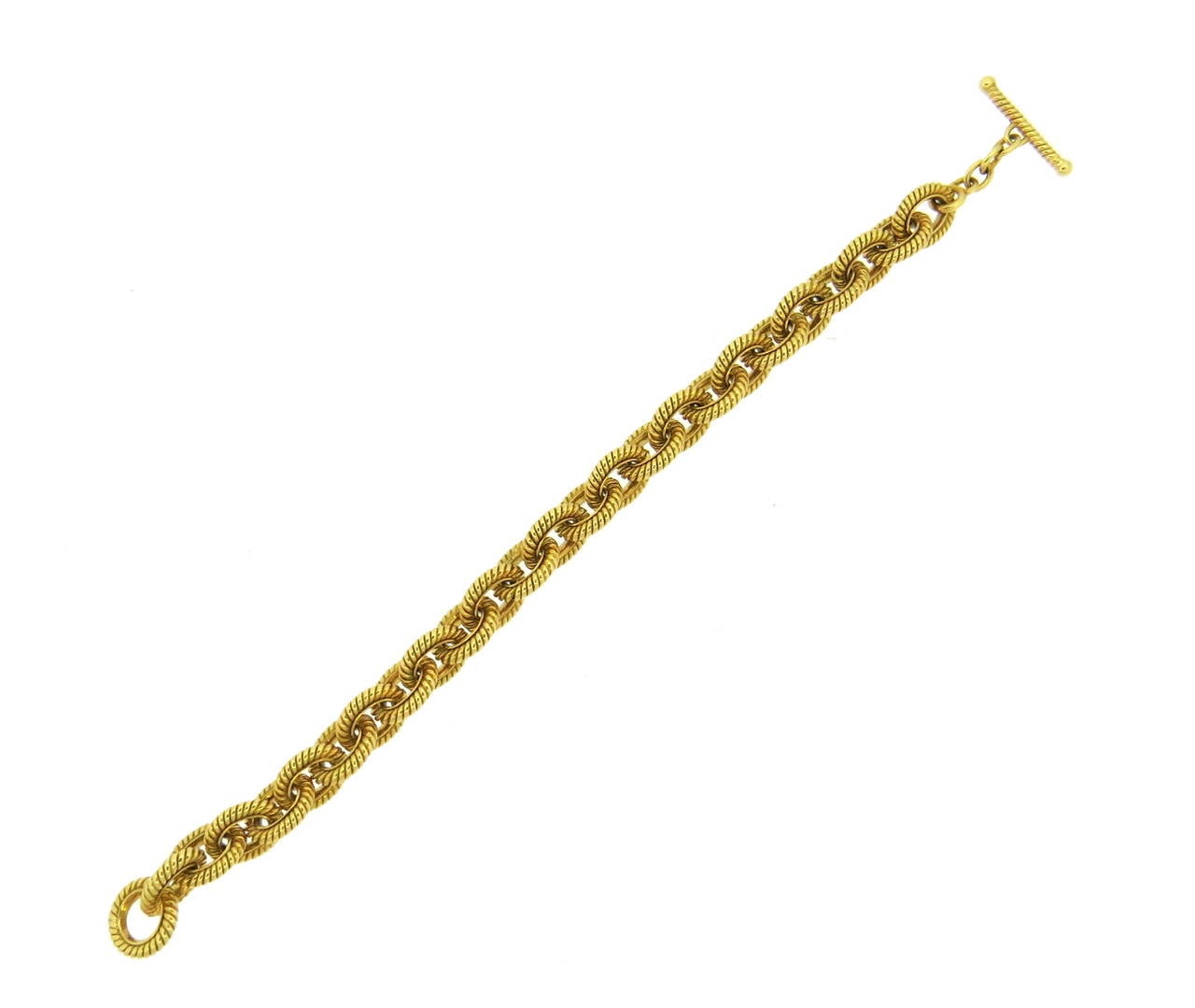 18k gold Tiffany & Co. link bracelet with toggle closure. Bracelet is 7 7/8
