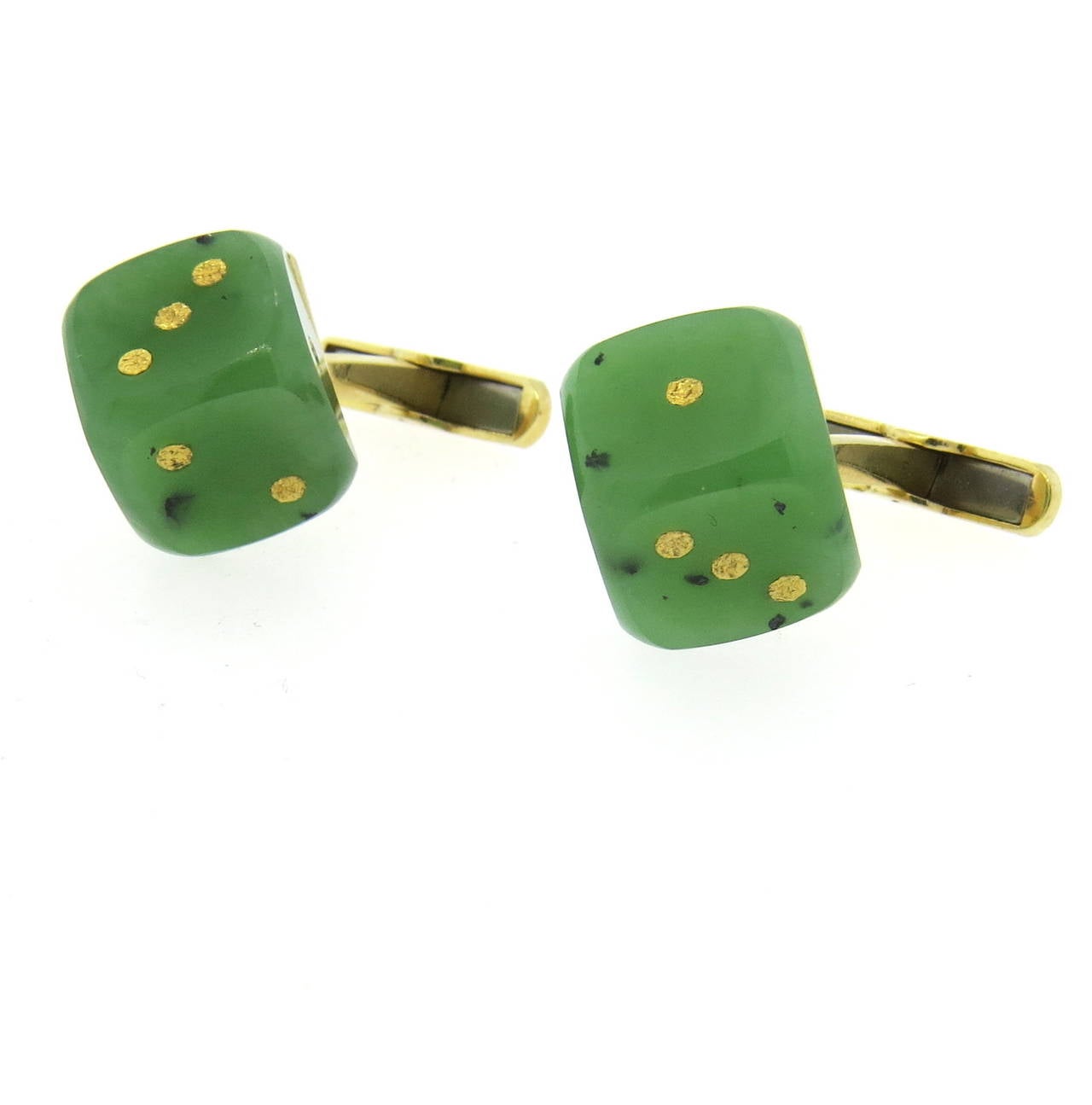 14k gold cufflinks, featuring jade top. Measuring 19mm x 20mm. Marked 14k. Weight - 21.9 grams