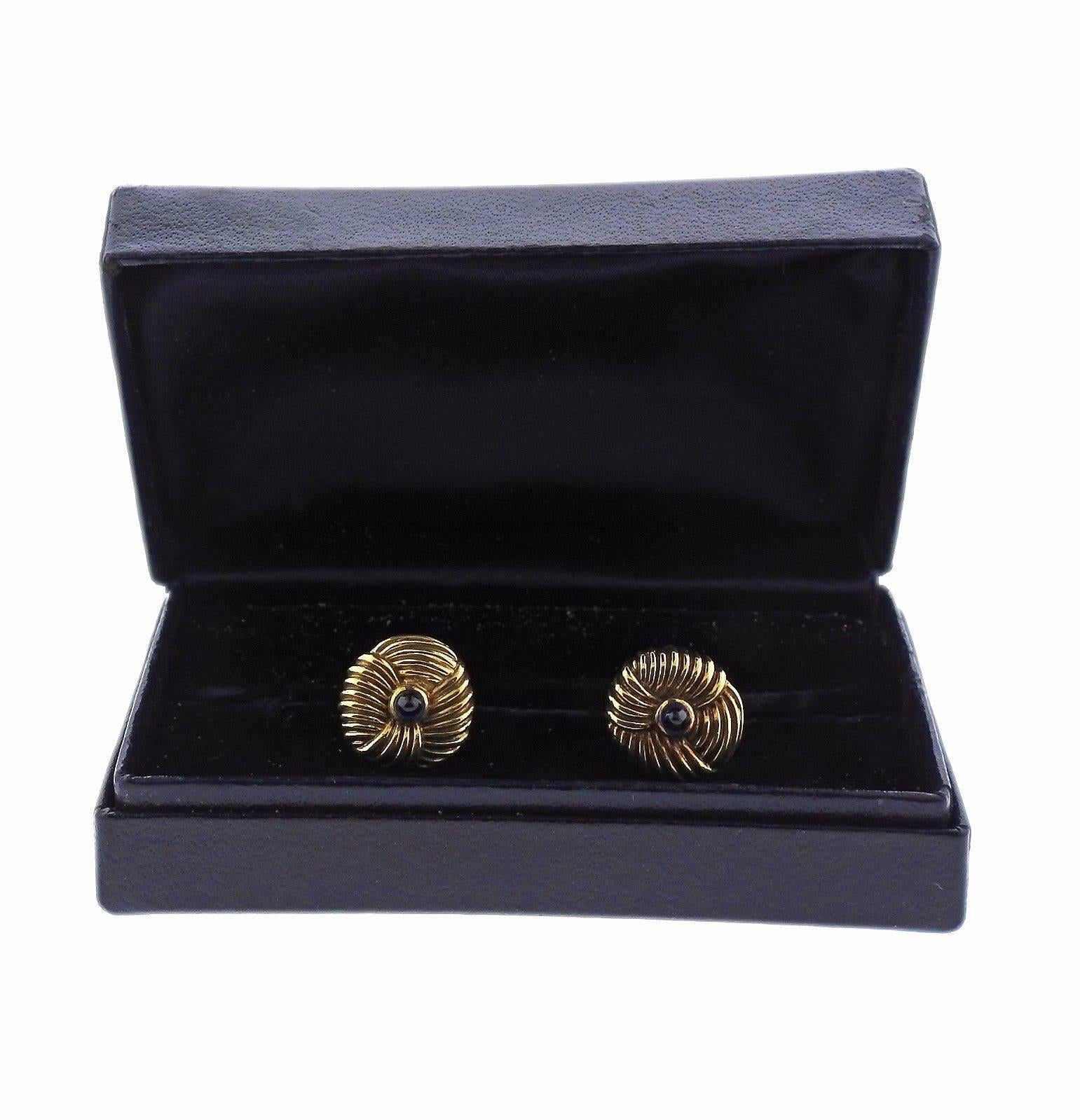 A pair of 18k yellow gold cufflinks set with sapphires.  The cufflinks measure 15mm in front and 11mm in back. The set weighs 17.4 grams.  Marked: Tiffany, Schlumberger.