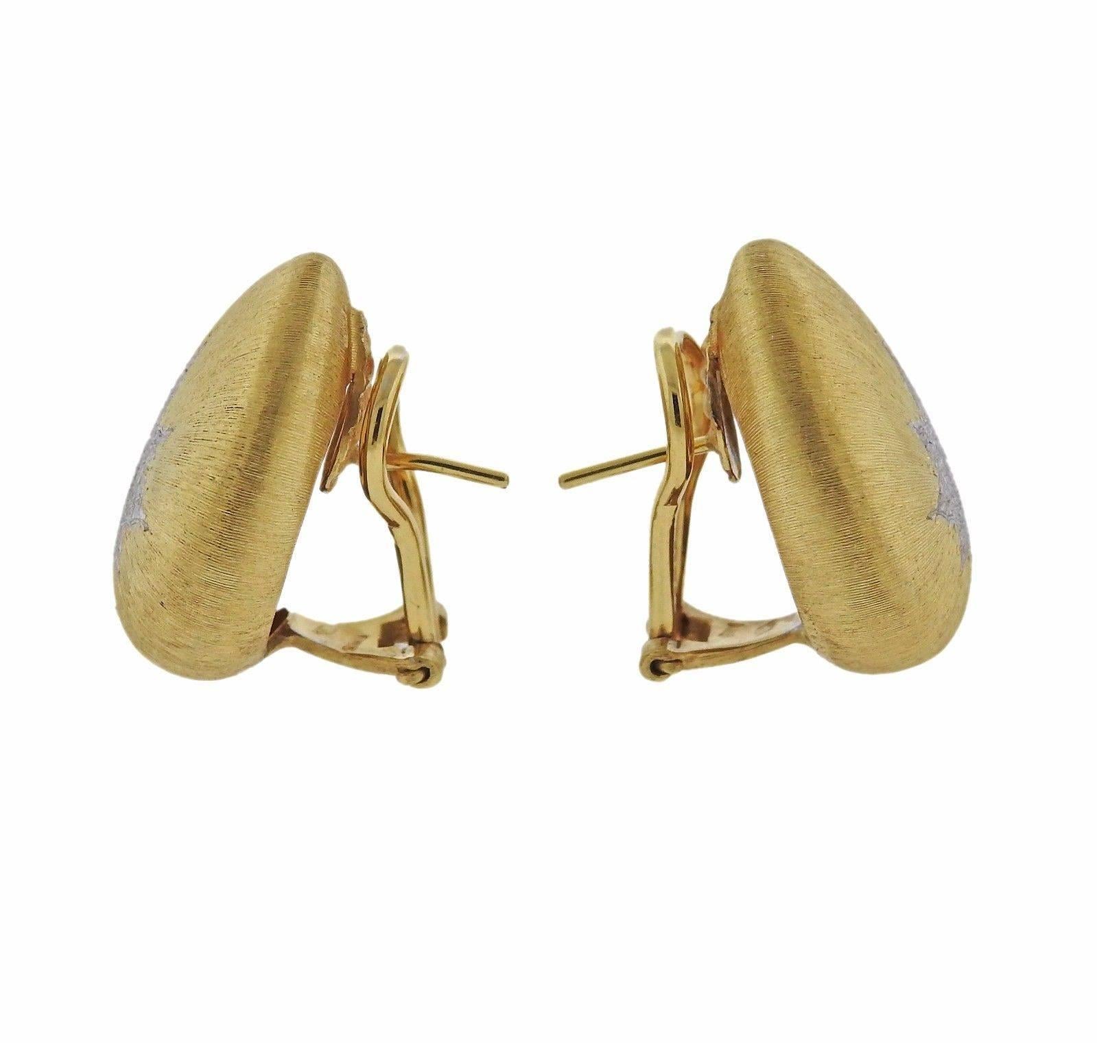 A pair of 18k yellow and white gold earrings by Buccellati.  The earrings measure 22mm x 18mm and weigh 14.8 grams.  Marked: Buccellati,Italy, 18k,P4026.  The current retail is $10100.