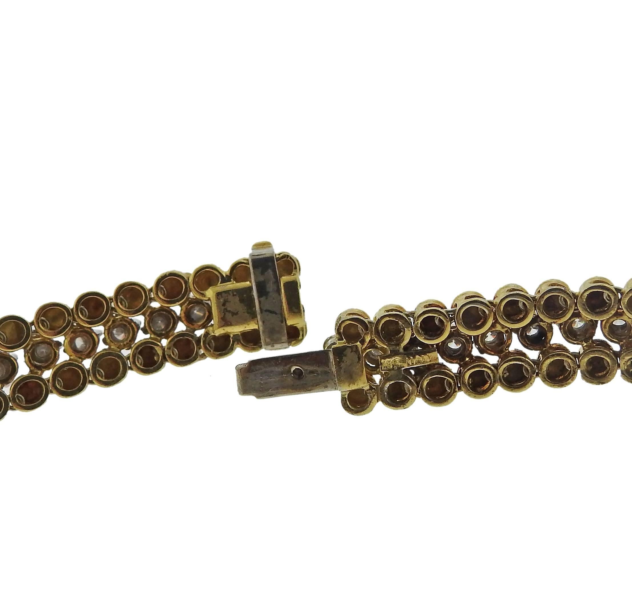 Vintage circa 1960s couscous necklace, set in 18k yellow gold, adorned with approximately 6.50ctw in diamonds. Necklace is 15" long and 12mm at widest point, weighs 89.9 grams. Marked: 18k Italy 