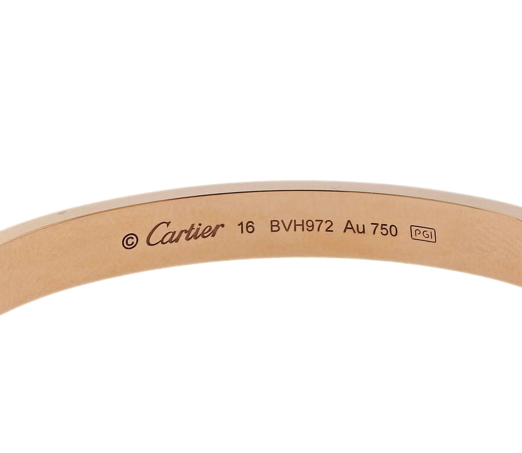 An 18k rose gold bangle bracelet crafted by Cartier for the Love collection. Bracelet is a size 16, interior dimensions are 1 11/16" x 2 1/8" , bracelet is 6.2mm wide. Marked Cartier, 16, BVH972, Au 750,  PGI. Weight is 30.1 grams. Comes