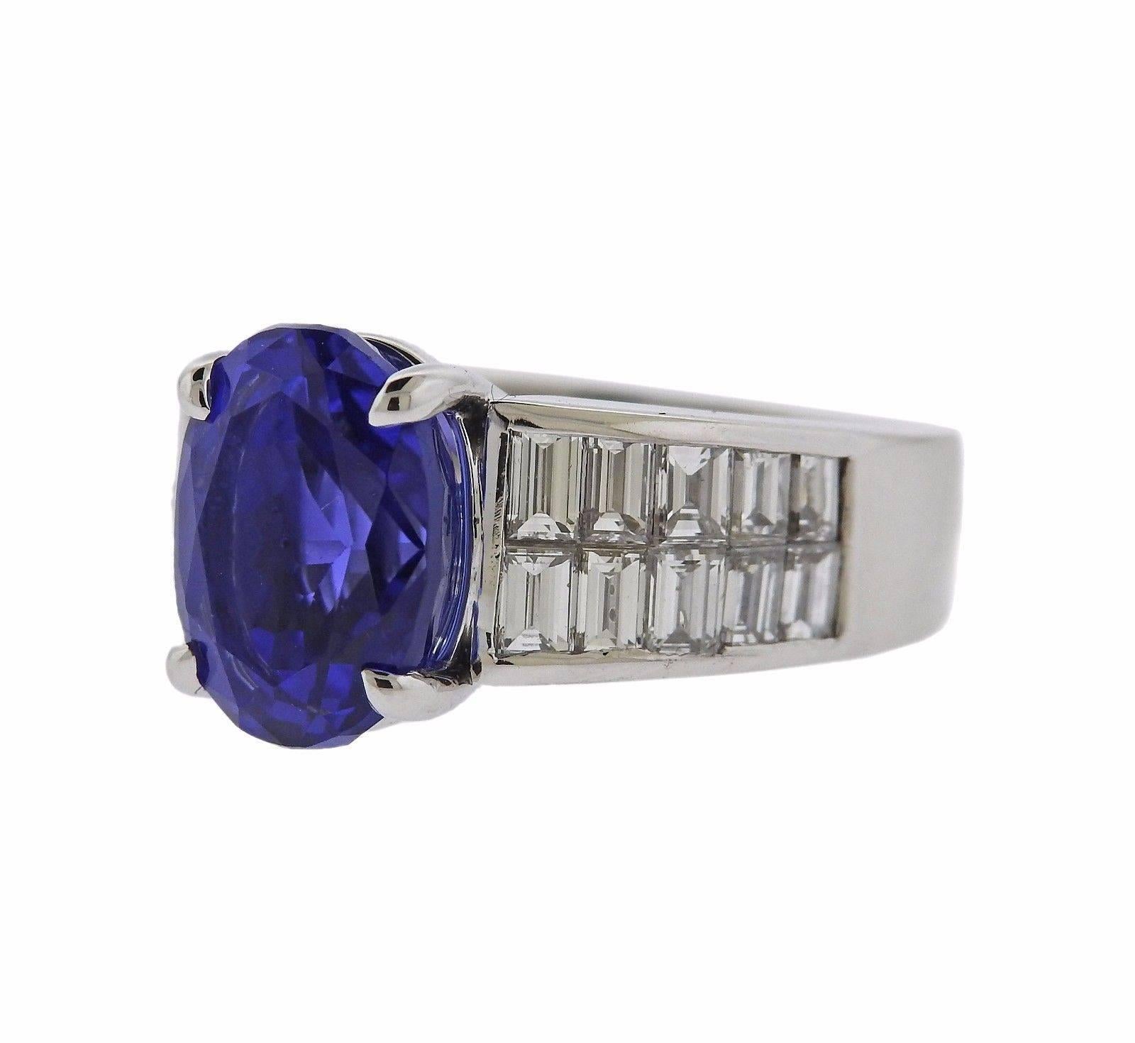 A 14k white gold ring set with a tanzanite weighing approximately 4.75 carats and approximately 0.80ctw of H/VS diamonds.  The ring is a size 5 1/4 and weighs 7.9 grams.  Marked: 14k, HT&NY.