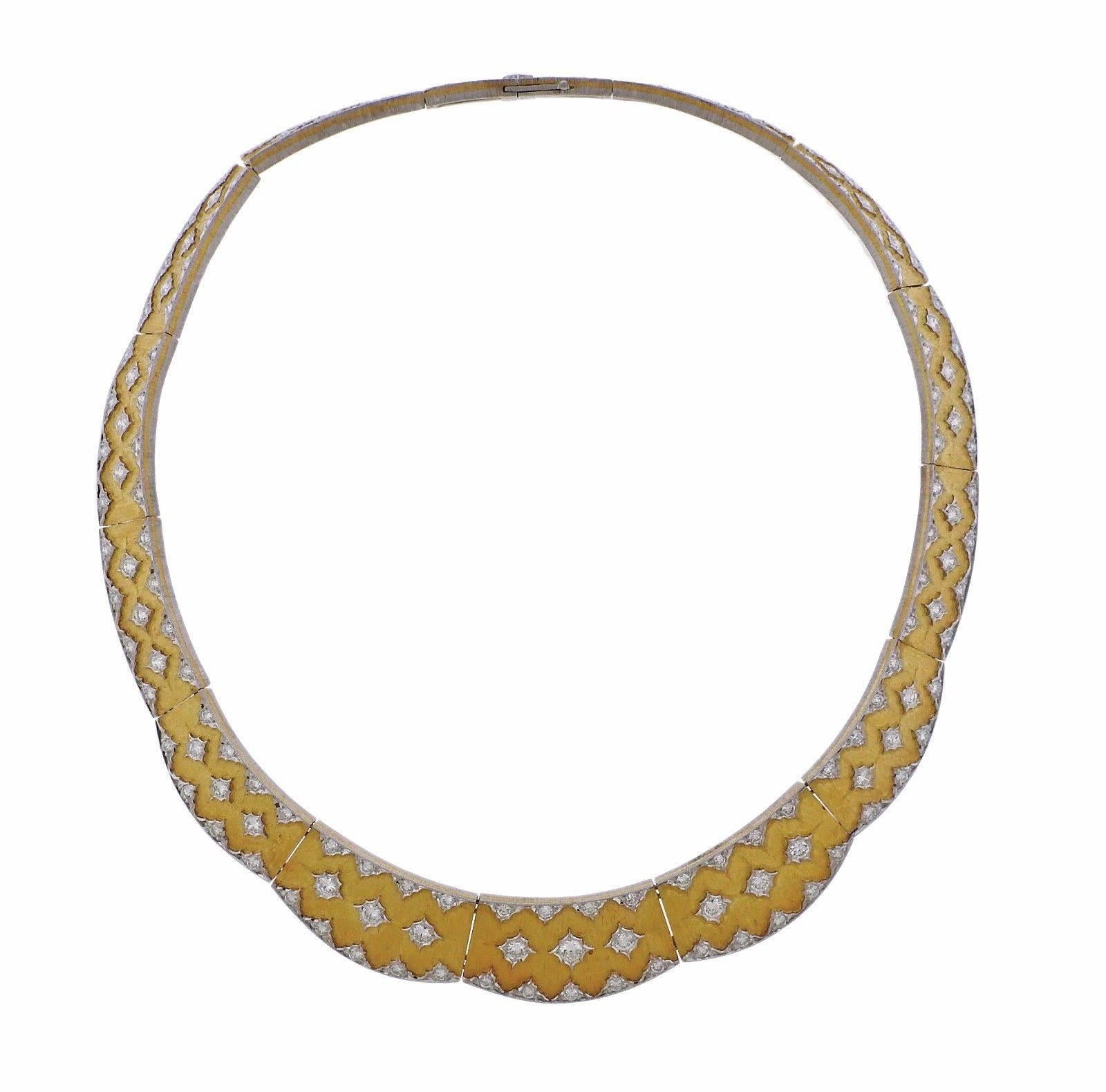 An 18k yellow and white gold necklace set with 4.5 carats of H/VS diamonds. 
 The necklace is 15 1/2