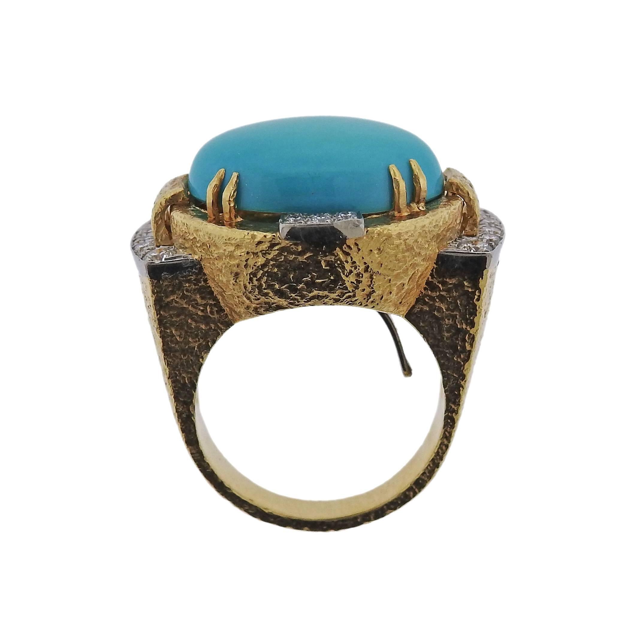 18k gold and platinum cocktail ring, crafted by David Webb, set with 14mm x 19mm  turquoise, surrounded with approx. 0.40ctw in H/VS diamonds. Ring size 9, ring top is 19mm x 27mm. Marked: Webb, 750, 900pt. Weight of the piece - 22.3 grams 
