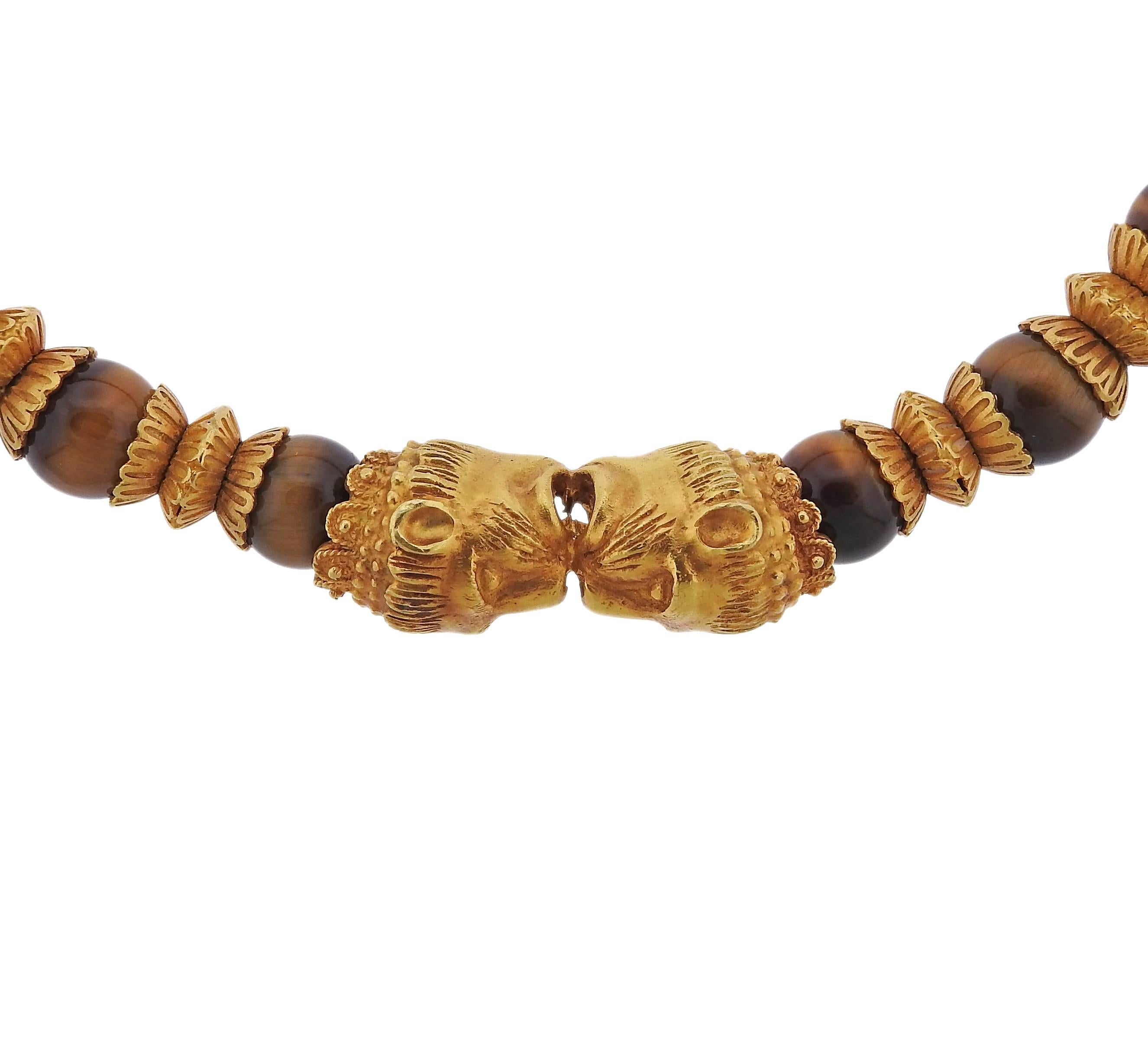 22k gold chimera necklace, crafted by Ilias Lalaounis, set with 10mm tiger's eye beads. Necklace is 15