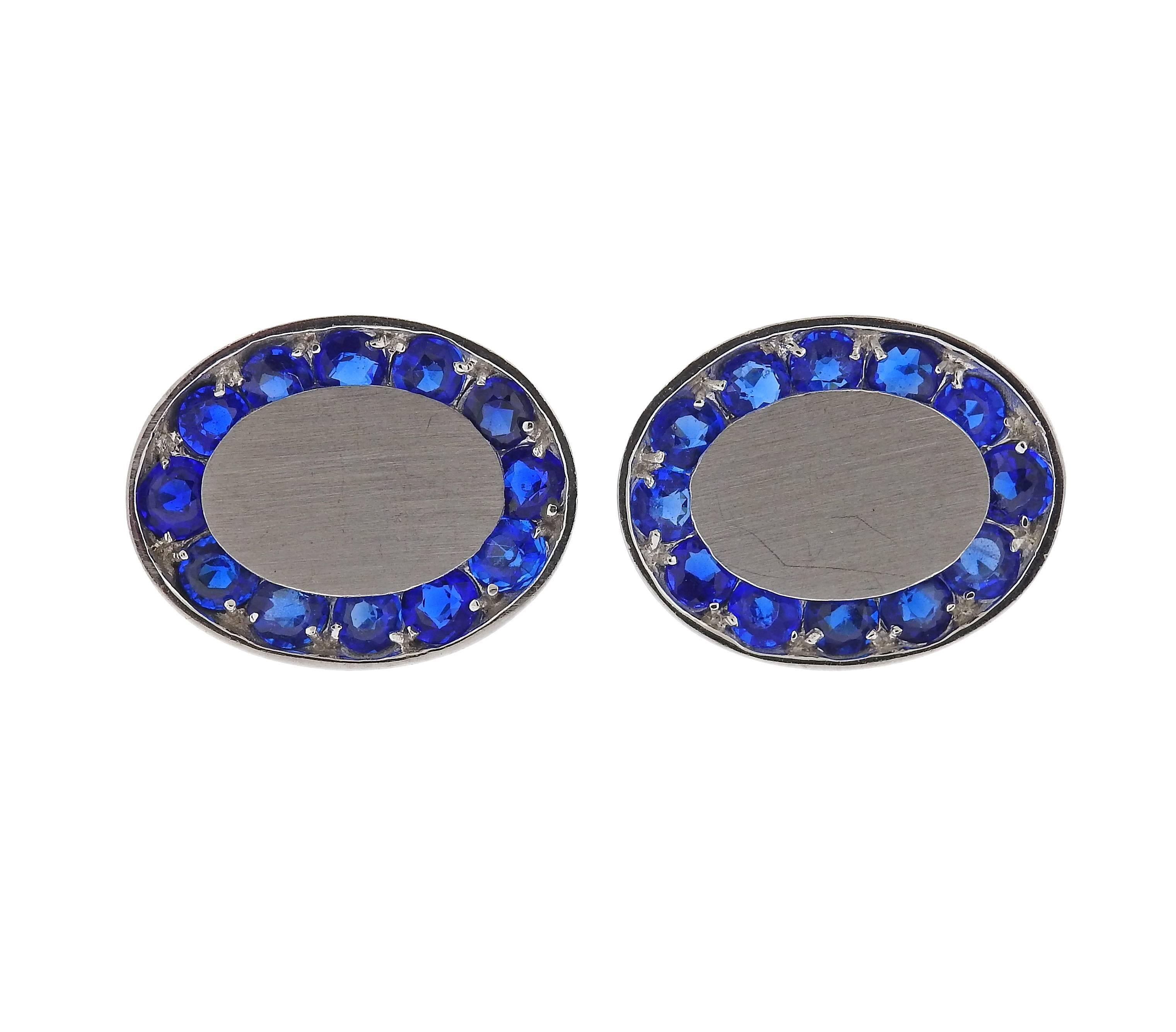 A pair of oval 14k gold cufflinks, crafted by Lucien Piccard, decorated with blue gemstones. Top measures 25mm x 20mm, weight - 19.2 grams. Lucien Piccard, 14k. 