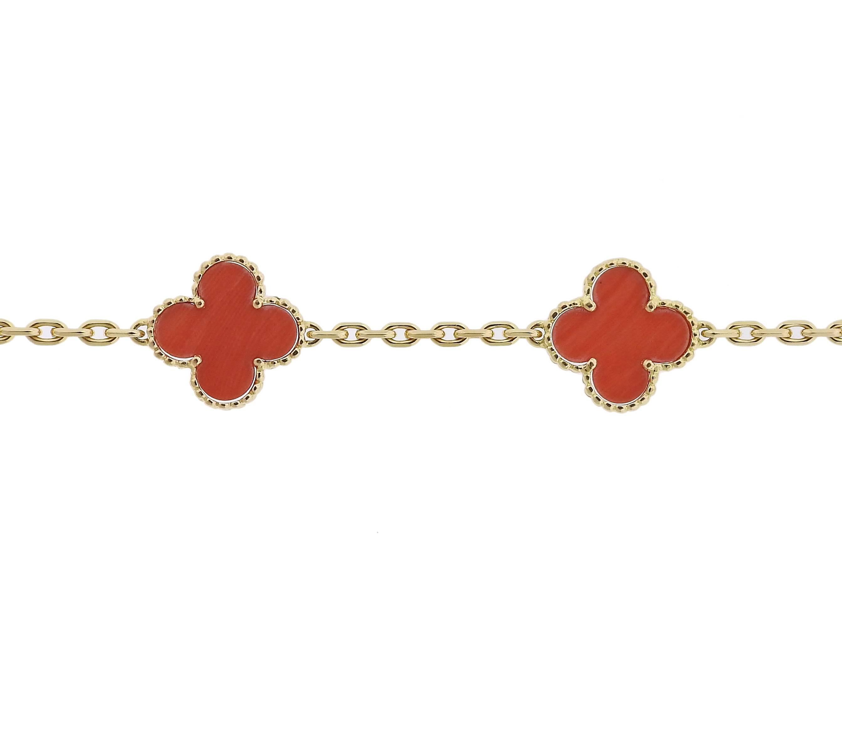 An 18k yellow gold bracelet, crafted by Van Cleef & Arpels for iconic vintage Alhambra collection, set with five coral motifs. Bracelet is 7 1/4" long, clovers measure 14.5mm x 14.5mm. Bracelet weighs 10.3 grams. Marked: BL 109***, VCA,