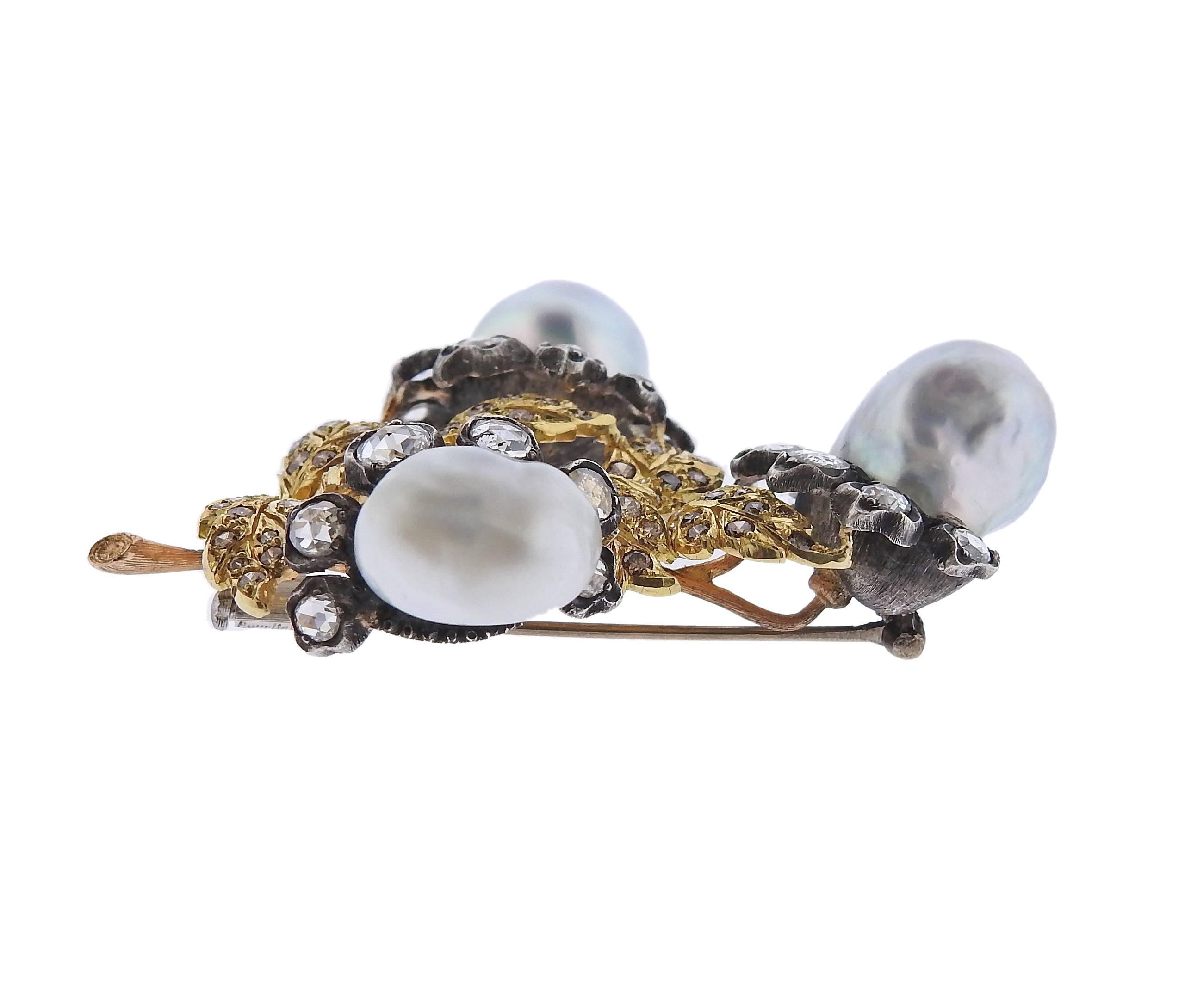An 18k gold silver Buccellati brooch featuring rose cut diamonds and baroque pearls. Brooch measures 60mm X 55mm. Marked 750, L3263, Buccellati, 18k, Italy . Weight is 31.8 grams. 