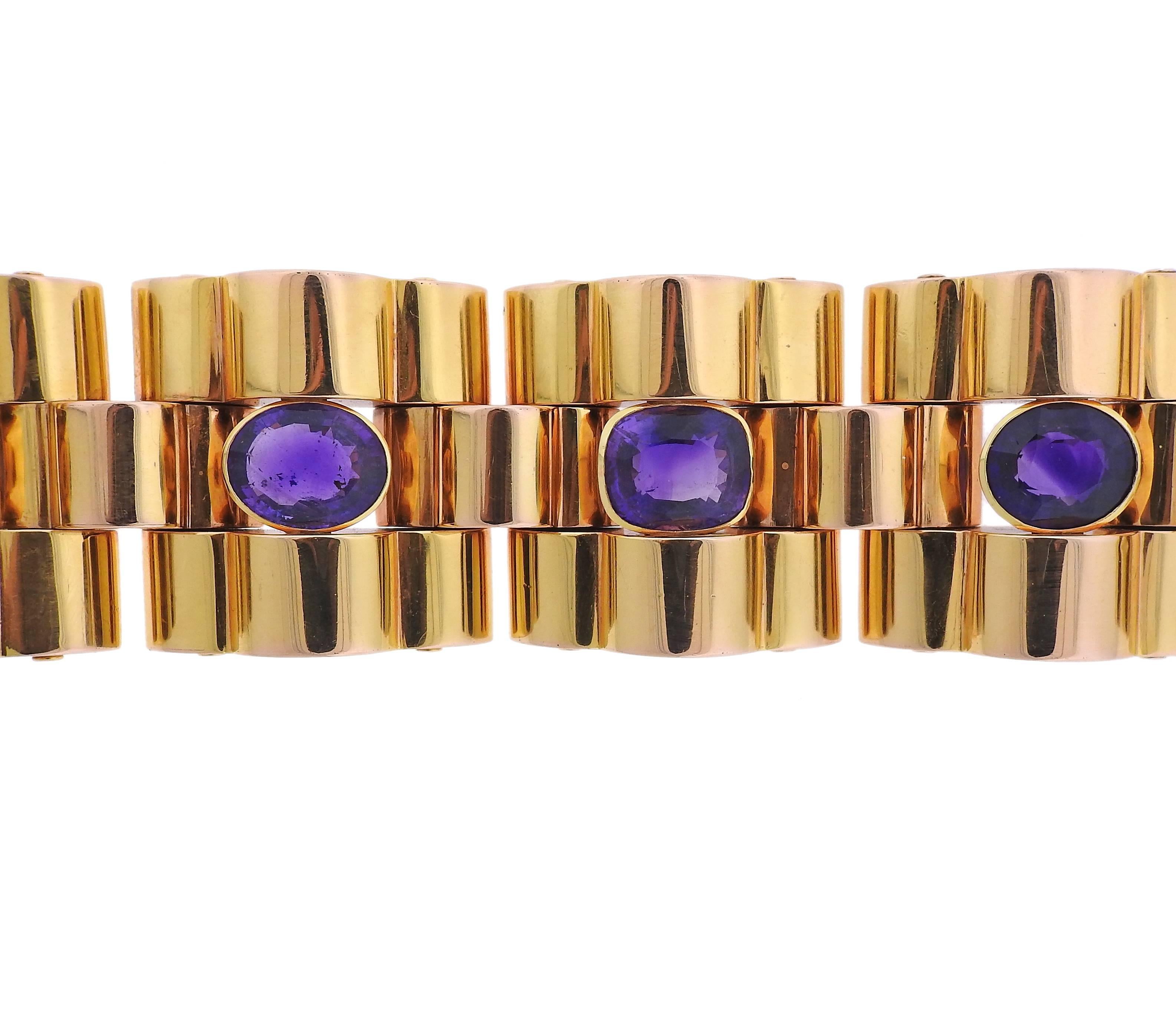 Large retro wide bracelet, set with amethyst gemstones in 18k gold. Bracelet is 7 7/8" long and 40mm wide, weighs 184.2 grams. Marked 18k. 