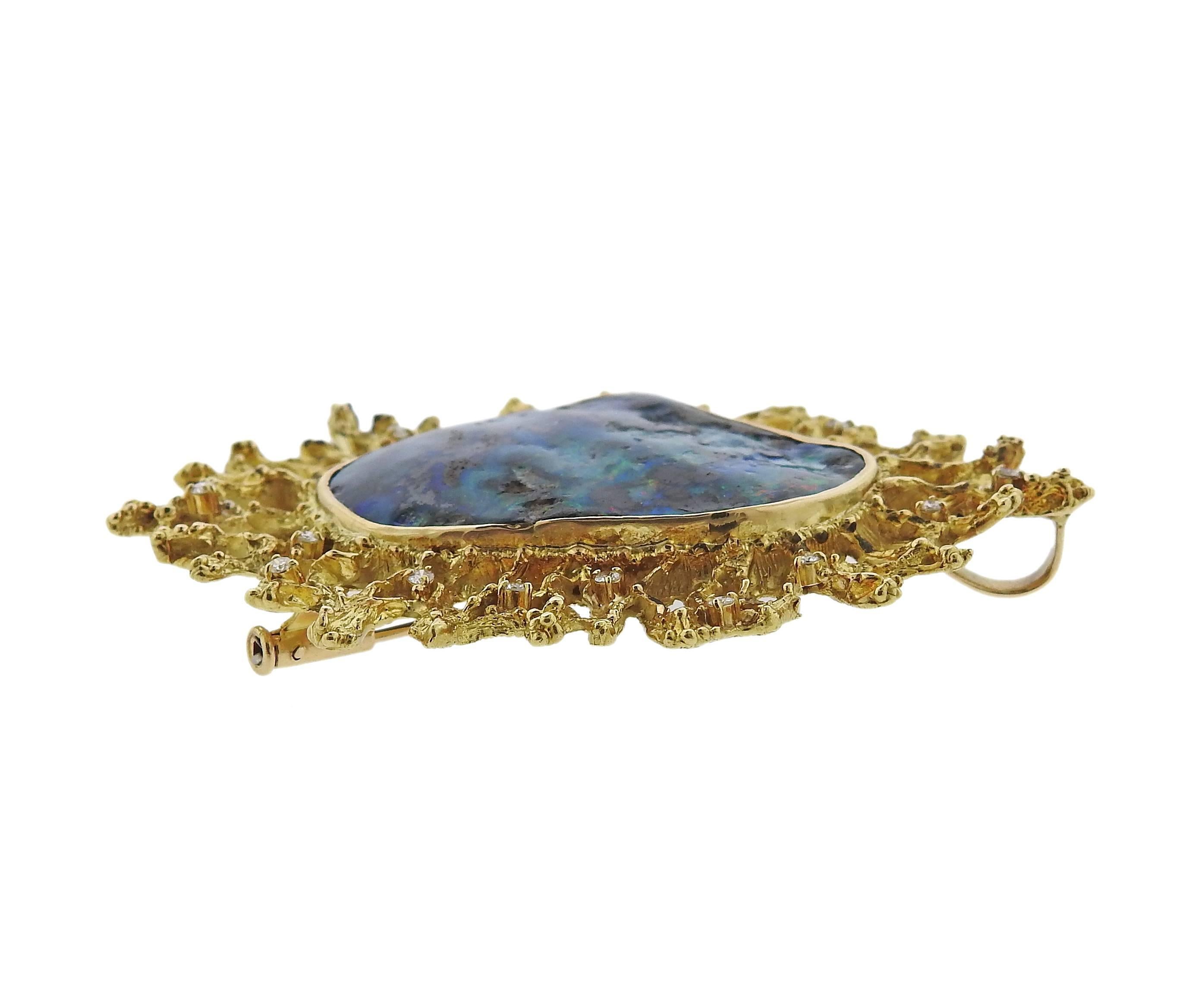 Vintage circa 1970s 18k gold brooch/pendant, set with opal in the center, surrounded with approx. 0.18ctw in diamonds. Brooch measures 61mm x 45mm and weighs 26.4 grams.  