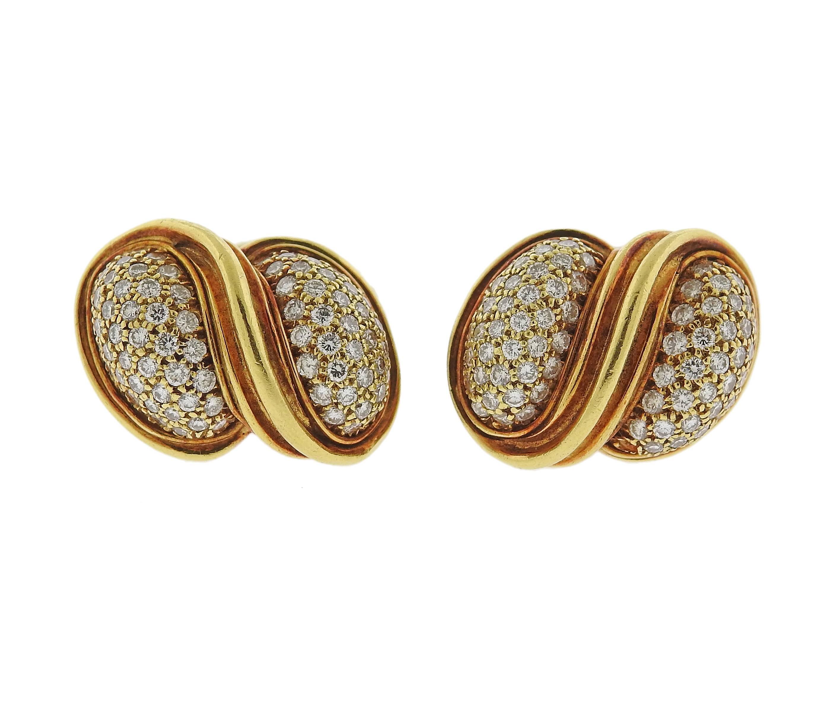 Pair of 18k yellow gold cufflinks, crafted by Henry Dunay, set with approximately 0.40ctw in diamonds.  Cufflink top measures 20mm x 13mm. Marked: Dunay 18k. Weight - 22.6 grams.  