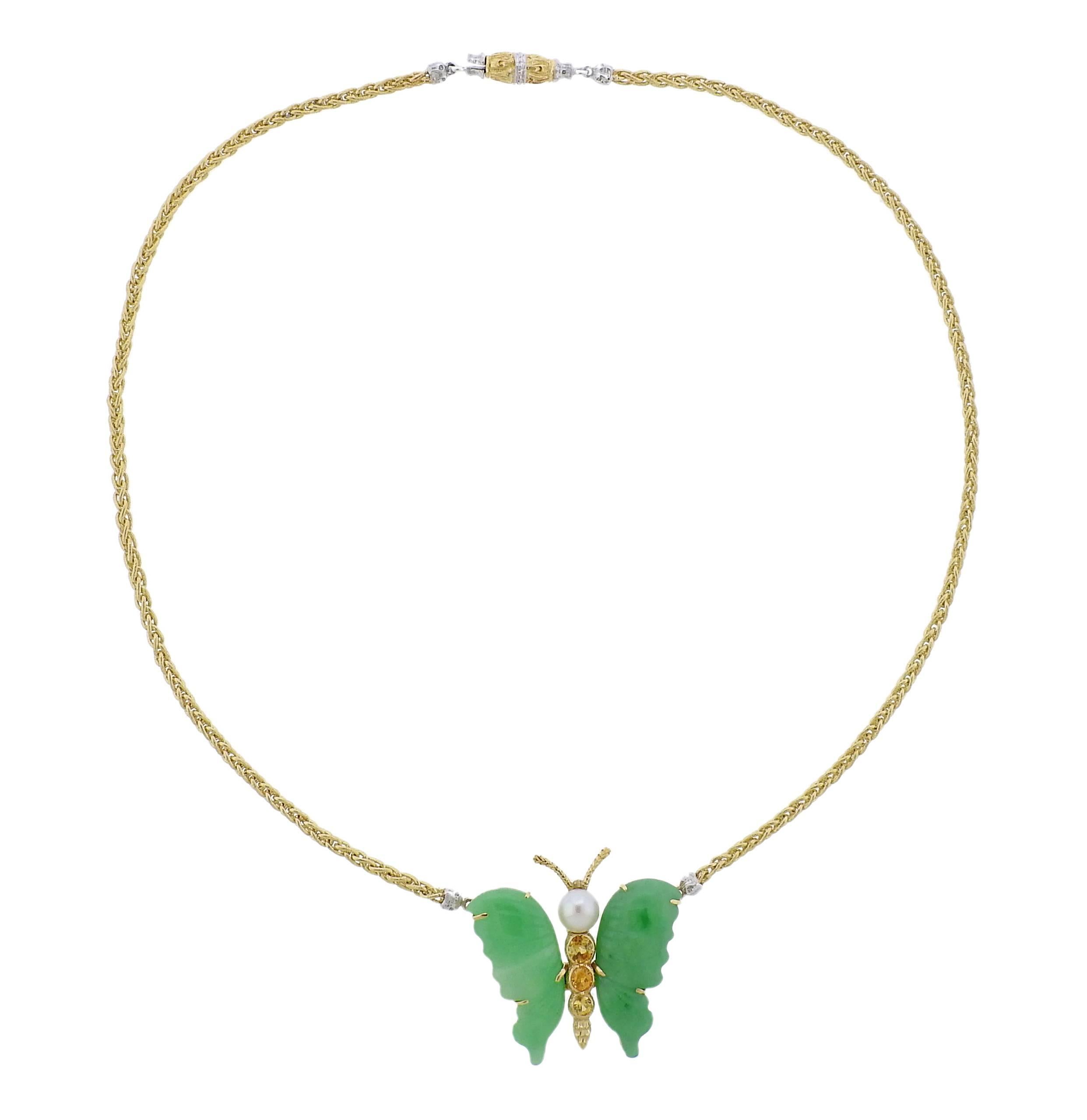 An 18k gold necklace, crafted by Buccellati, featuring butterfly pendant, adorned with carved jade wings, citrines and a pearl. Necklace is 16 inches long, pendant is 32mm x 28mm. Marked: Buccellati, Italy, 18k, S5005. Weight - 19.8 grams.
Retail