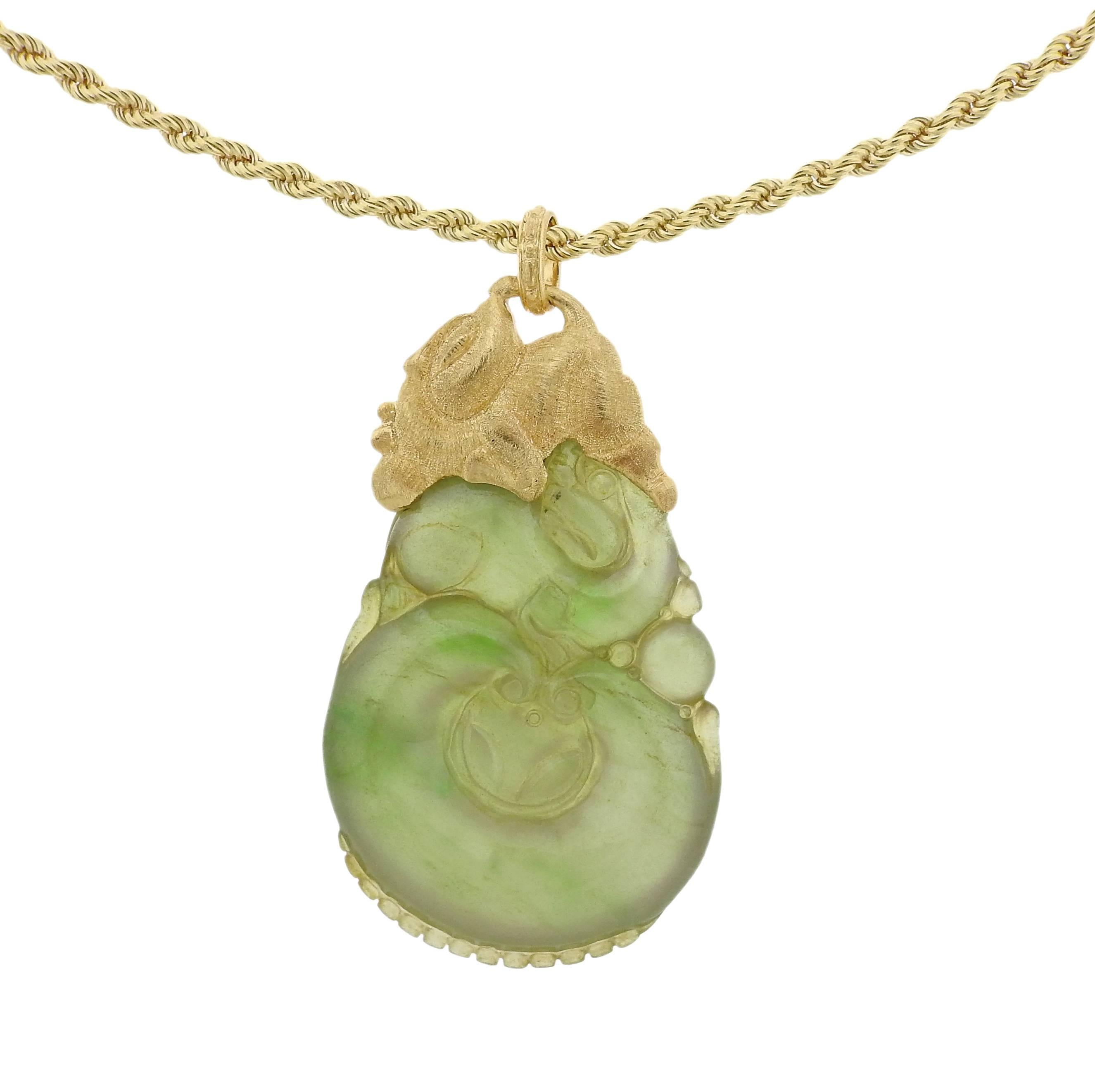 An 18k yellow gold chain necklace, crafted by Buccellati, featuring large carved jade pendant.  Necklace is 25 inches long, Pendant - 68mm x 35mm. Marked: Buccellati, Italy, 18k, S6102. Weight - 80 grams.
Retail $32300.