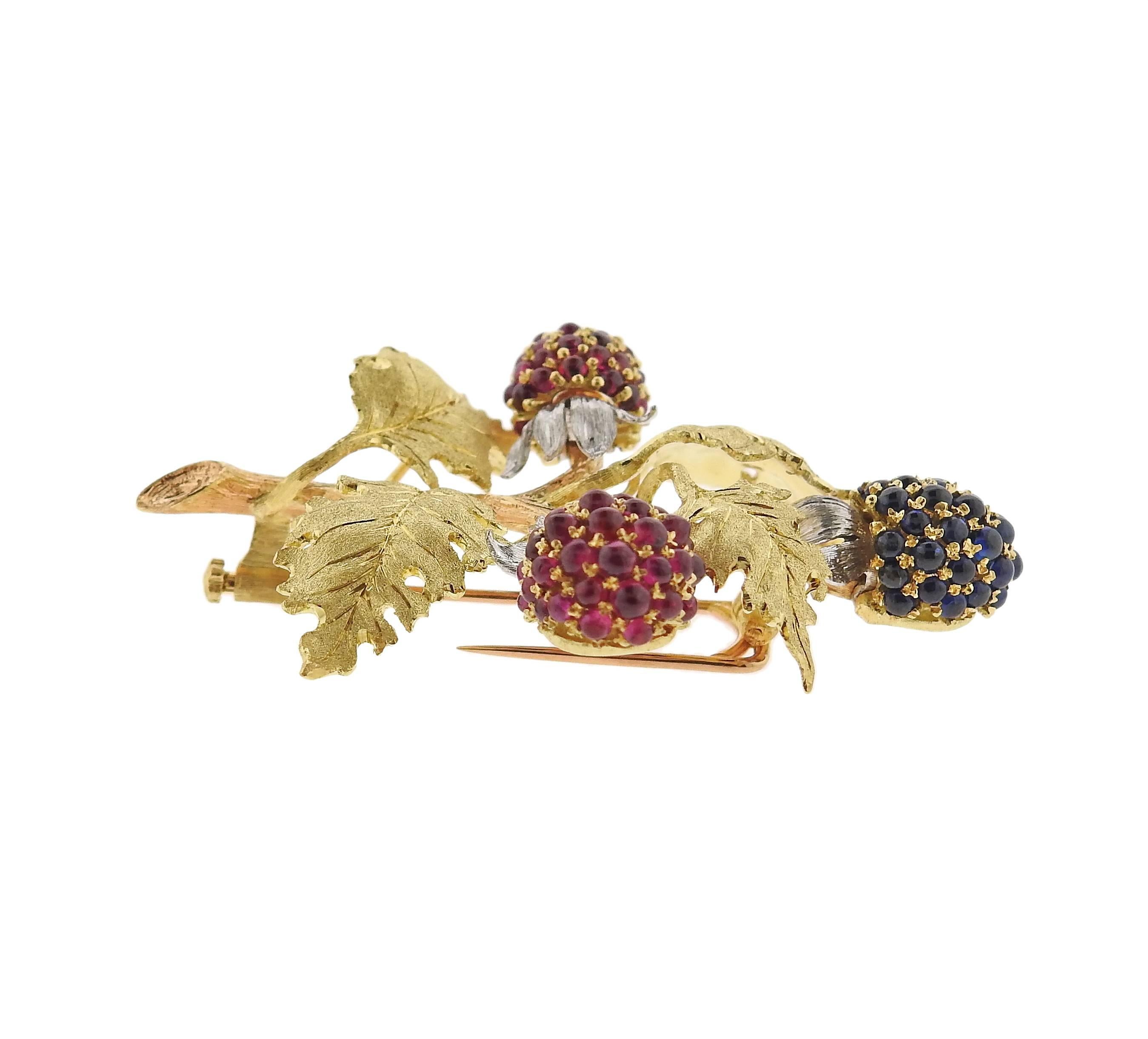An 18k yellow, rose and white gold brooch, crafted by Buccellati , featuring berries, adorned with rubies and sapphires. Brooch is 55mm x 40mm. Marked: Buccellati, Italy, 750, 18k. Weight of the piece - 20.3 grams.
With pouch. Retail $29800.
