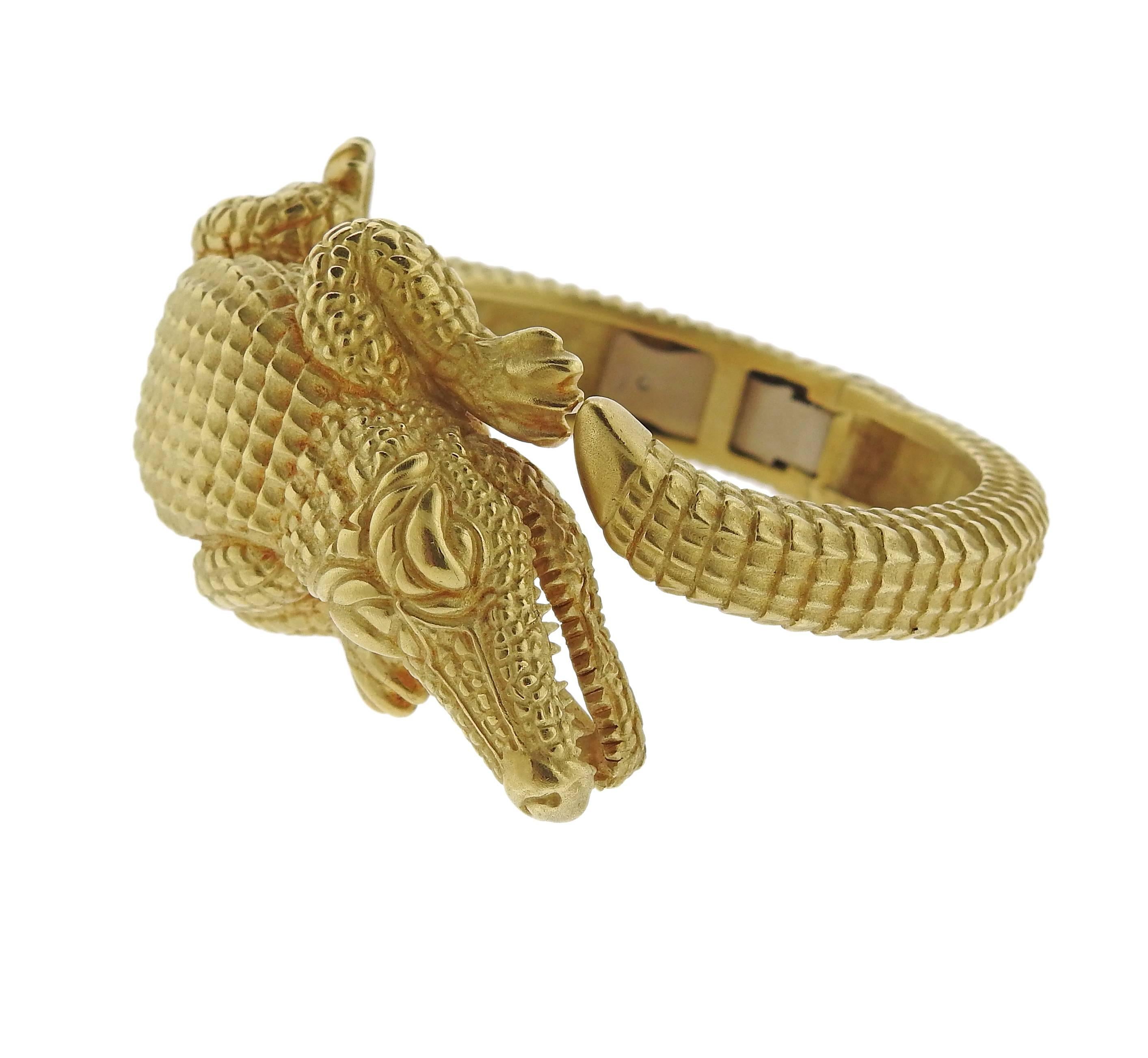 Iconic alligator bracelet, crafted by Kieselstein Cord in 18k yellow gold. Bracelet will fit approx. 7" wrist and is 35mm wide, weighs 164.5 grams. Marked: 750, B.Kieselstein-Cord, 18k, Maker's mark.