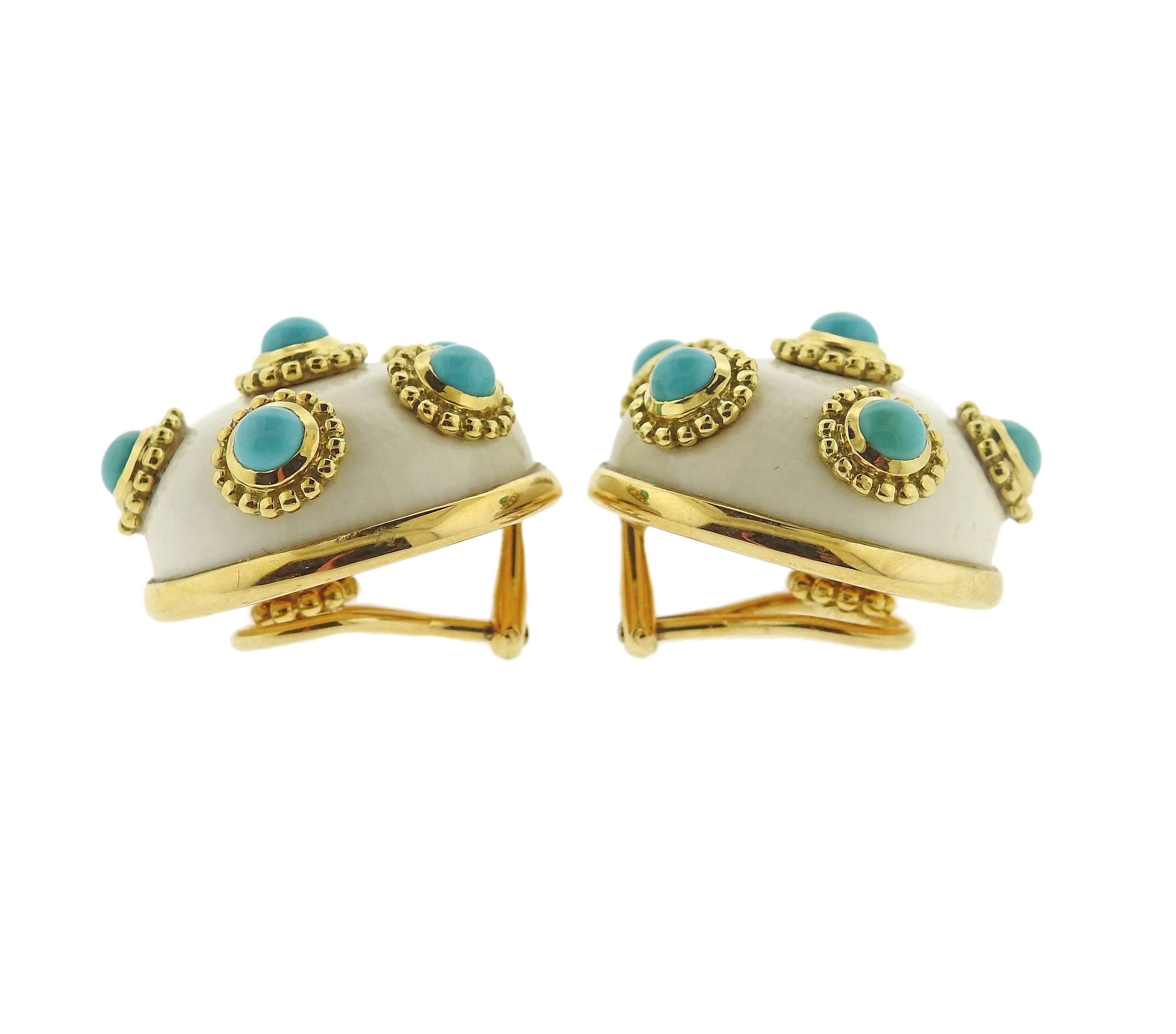 A pair of 18k gold button earrings crafted by Adria de Haume  featuring turquoise cabochons over a mammoth ivory. Earrings measure 24mm in diameter. Marked haume 750 35169. Weight is 31.2 grams. 
