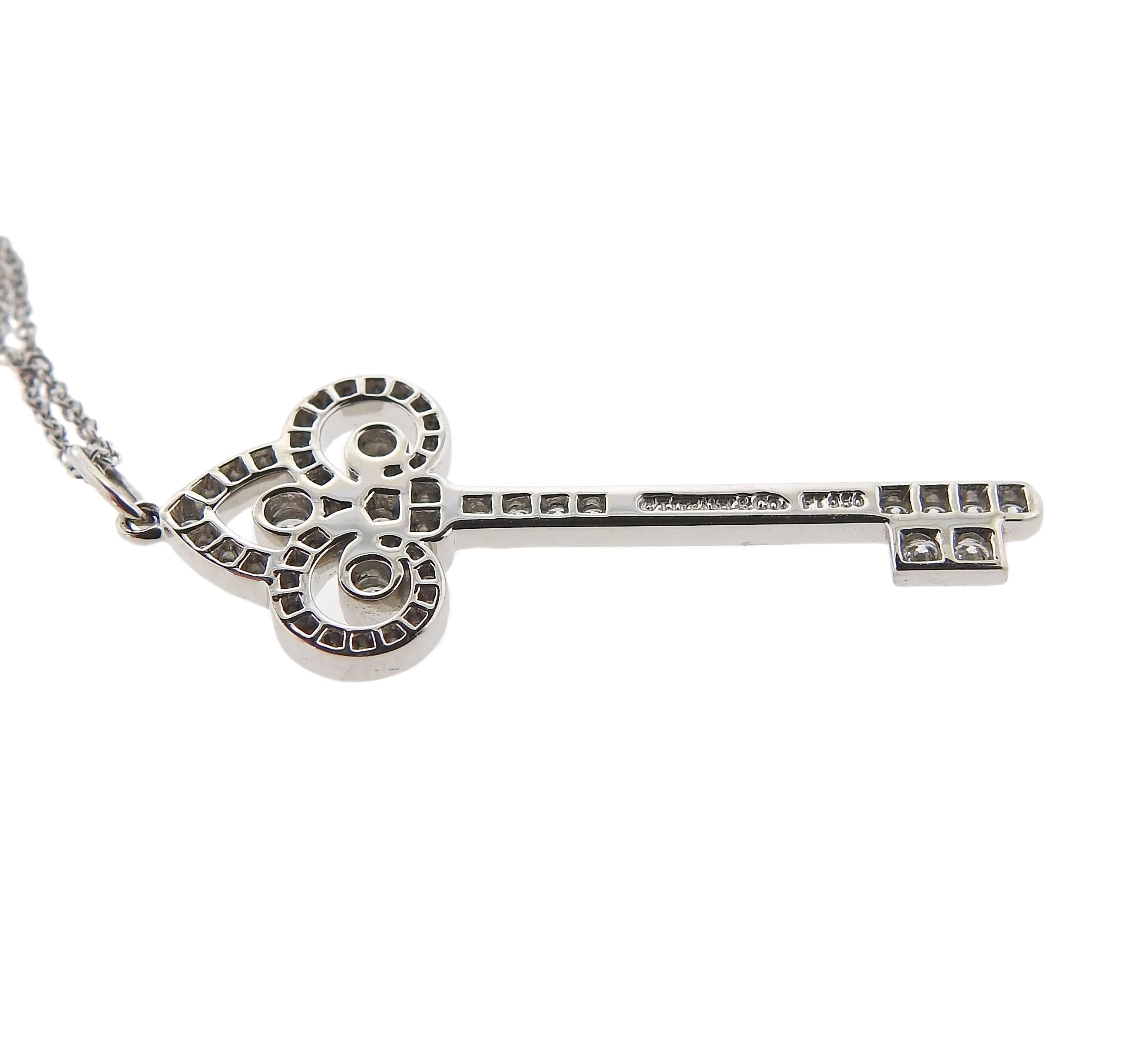 Tiffany & Co. Diamond Platinum Fleur-de-Lis Key Pendant Necklace In Excellent Condition In Lambertville, NJ