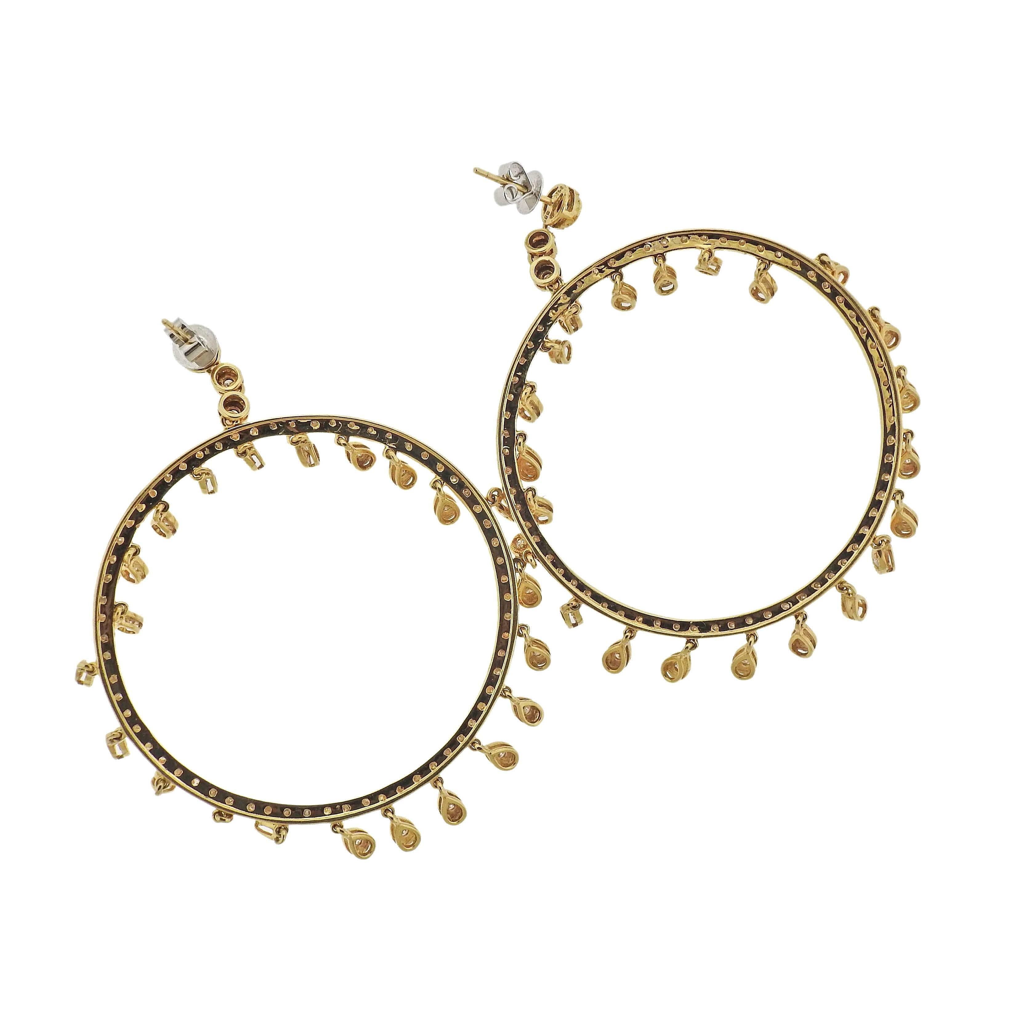 Pair of large circle drop earrings, crafted in 14k yellow gold, decorated with approximately 1.85ctw in diamonds.  Earrings are 69mm long, circles are 48mm in diameter. Marked: 585 14k. Weight - 17.8 grams.