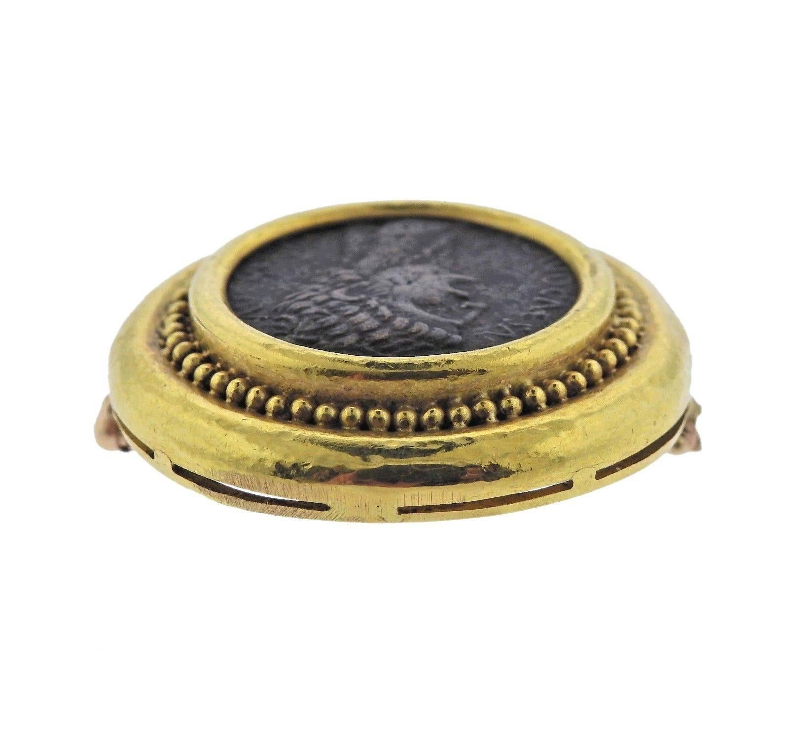 An 18k gold brooch set with an ancient bronze coin.  Crafted by Elizabeth Locke, the brooch measures 35mm in diameter and weighs 30.9 grams.  Marked: Maker's Mark, 18k.