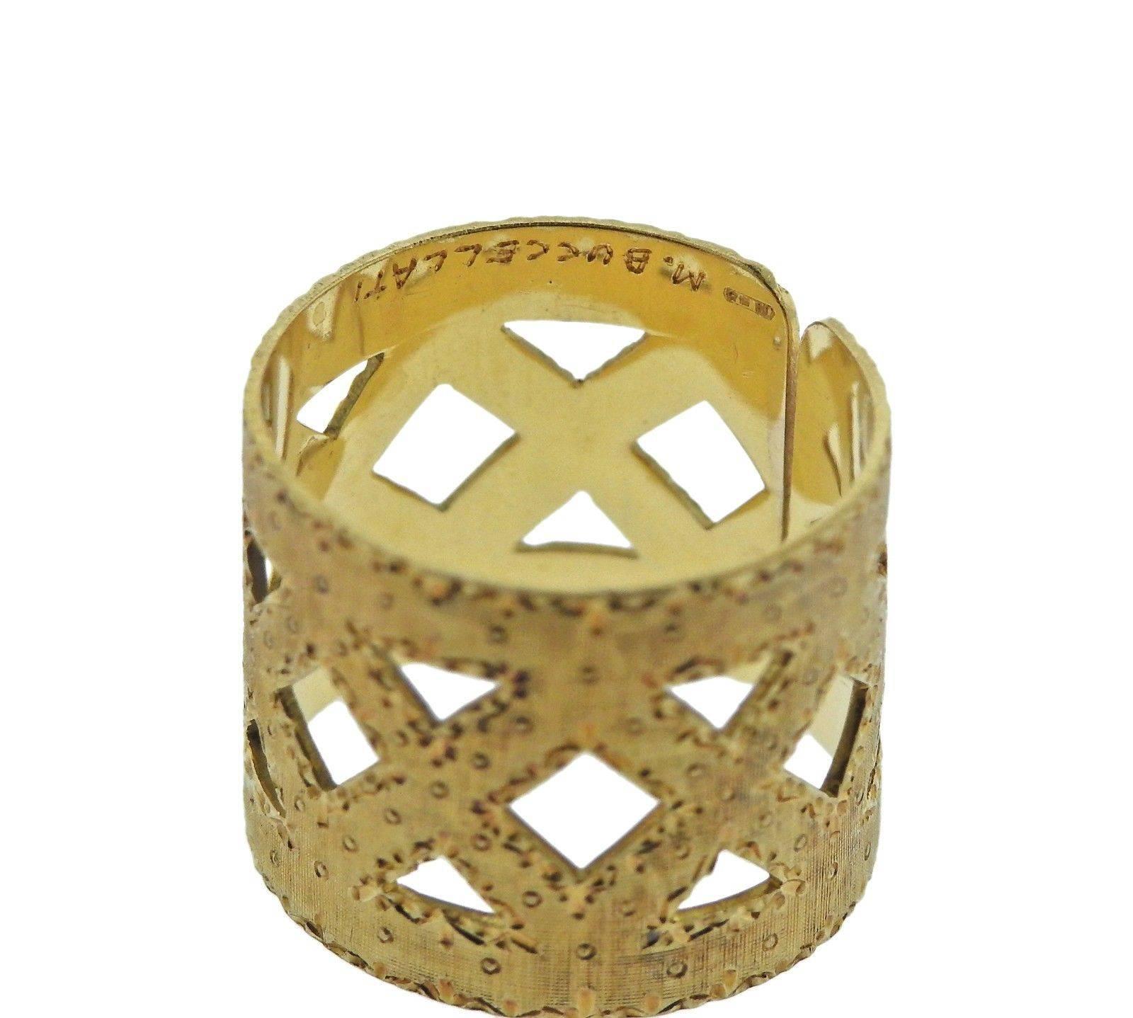 An 18k gold band ring crafted by Mario Buccellati.  The ring is a size 5 1/2 and is 15mm wide.  Marked: M. Buccellati.  The weight of the piece is 6.1 grams.