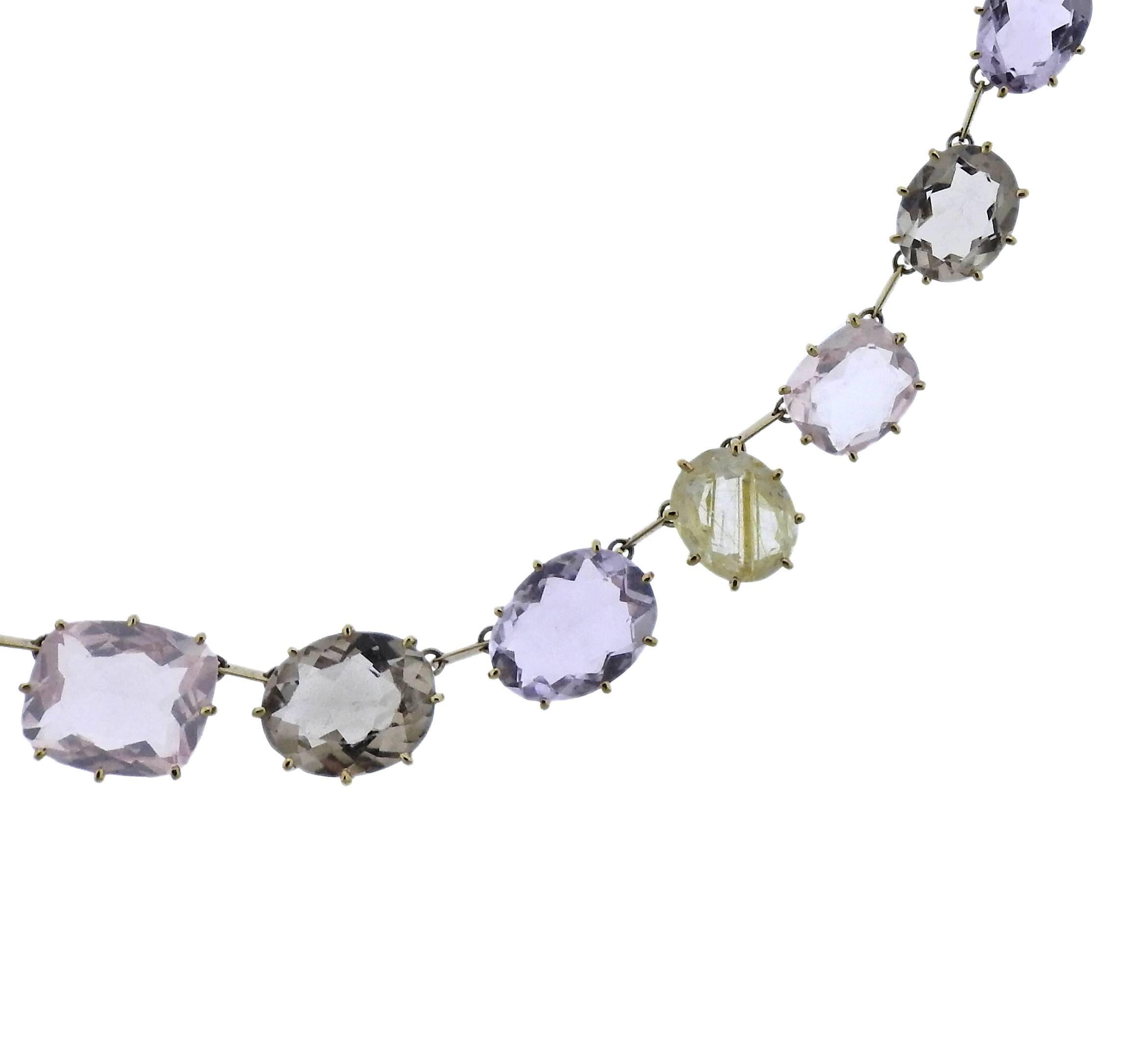 Beautiful H. Stern Sunrise necklace, set with amethysts and quartz gemstones, adorned with a diamond. Necklace is 16 1/2" long and 11mm at widest point. Weight 26.9 grams. Marked:750, S and Star marks.  Current retail price $10300