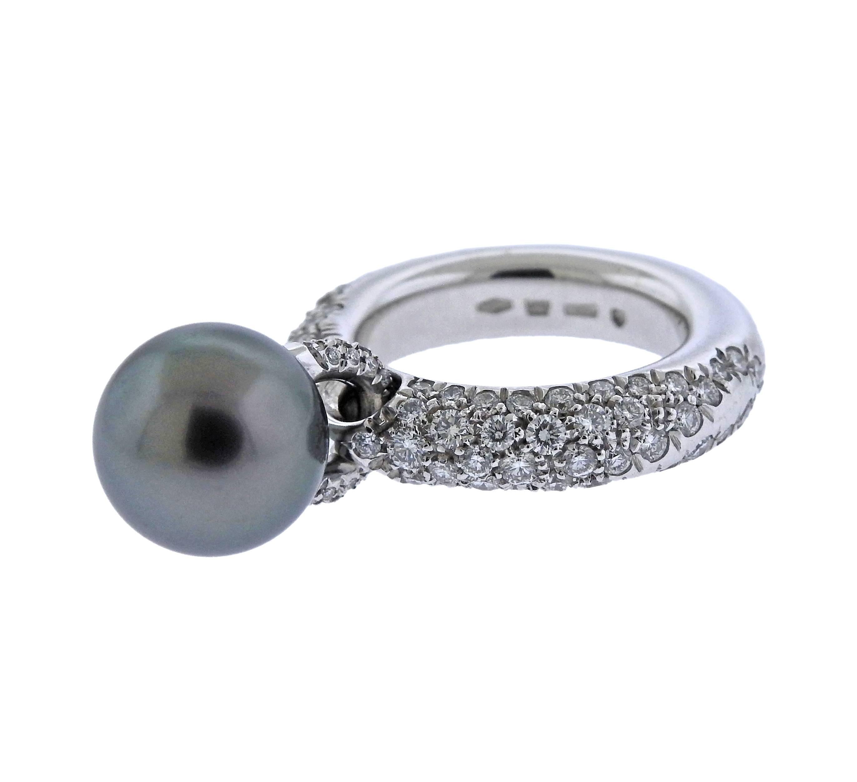 18k white gold ring, crafted by Mikimoto, featuring approx. 170ctw in diamonds and an 11.6mm Tahitian pearl charm. Ring size 6 1/2, shank is 5.1mm wide, weighs 18.7 grams. Marked: 750, made in Italy, 2294AI, M hallmark. 
