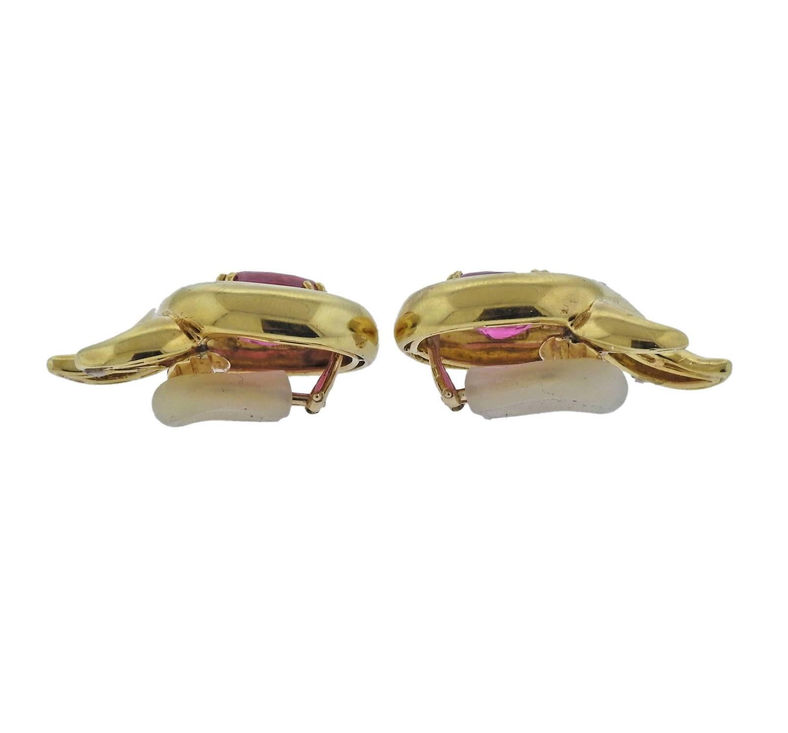 A pair of 18k gold earrings crafted by Verdura. Earrings feature pink tourmalines measuring 14.5mm x 11.2mm. Earrings measure Earrings are 36mm x 21mm and weigh 29.3 grams. 