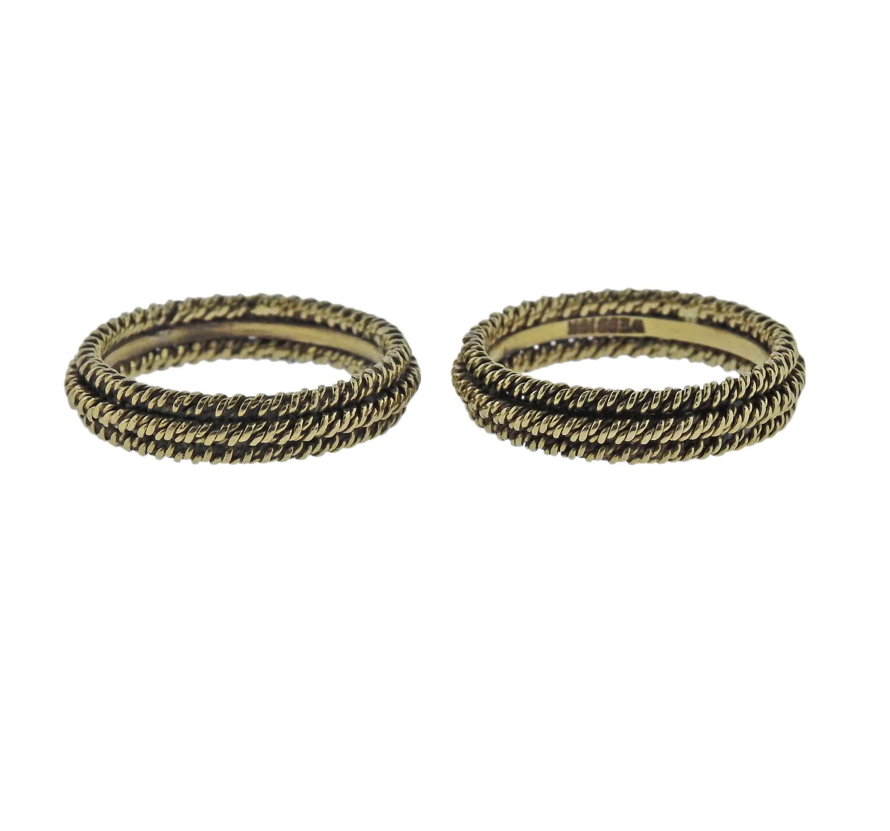A pair of two 18k gold ring guards crafted by David Webb. Each ring size 7, each is 4.6mm wide, total weight is 8.7 grams. 
