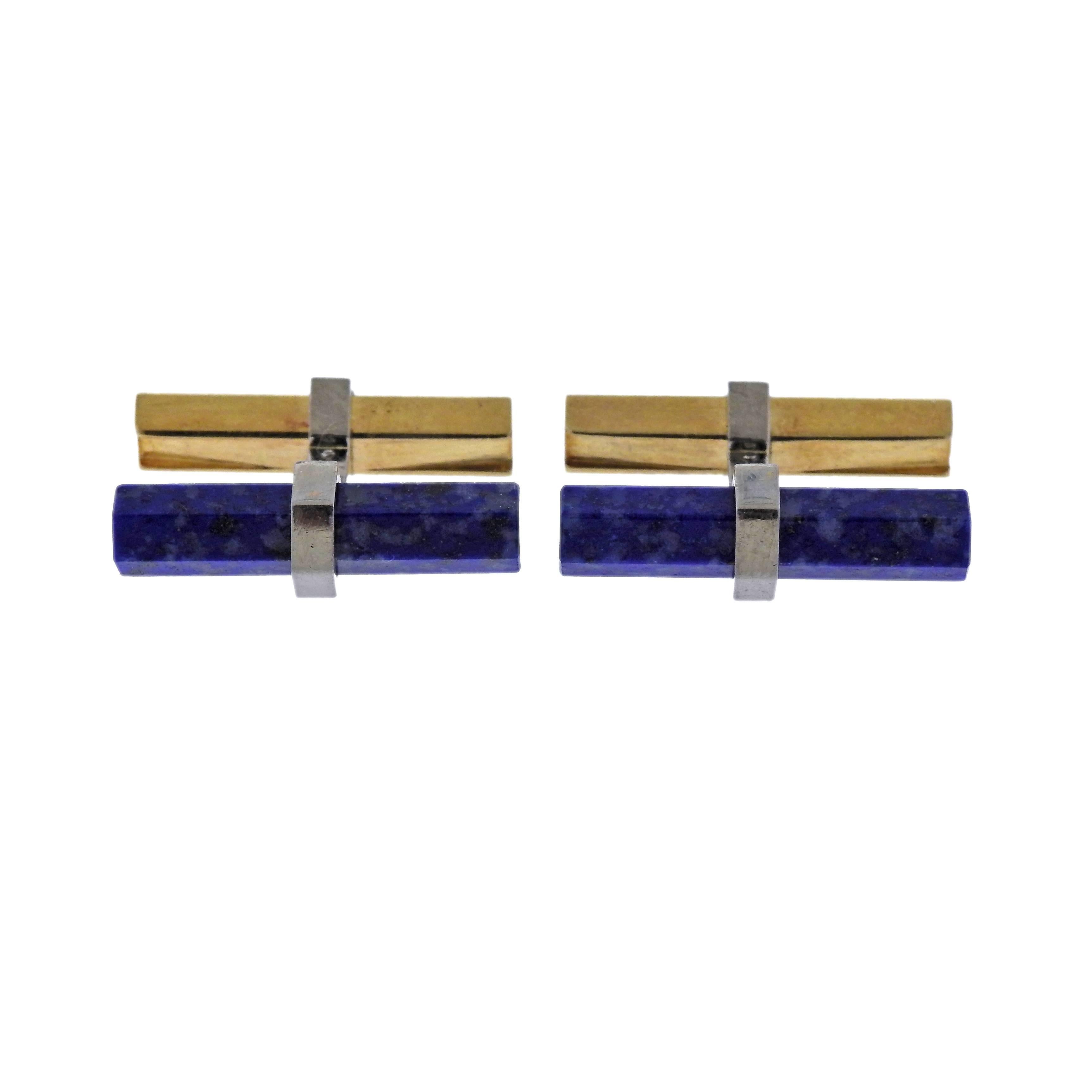 Pair of classic 18k gold bar cufflinks, decorated with lapis lazuli, crafted by Cartier. Each bar measurs 24mm x 5mm, weigh 12.1 grams. Marked: Cartier, 36781, 750.