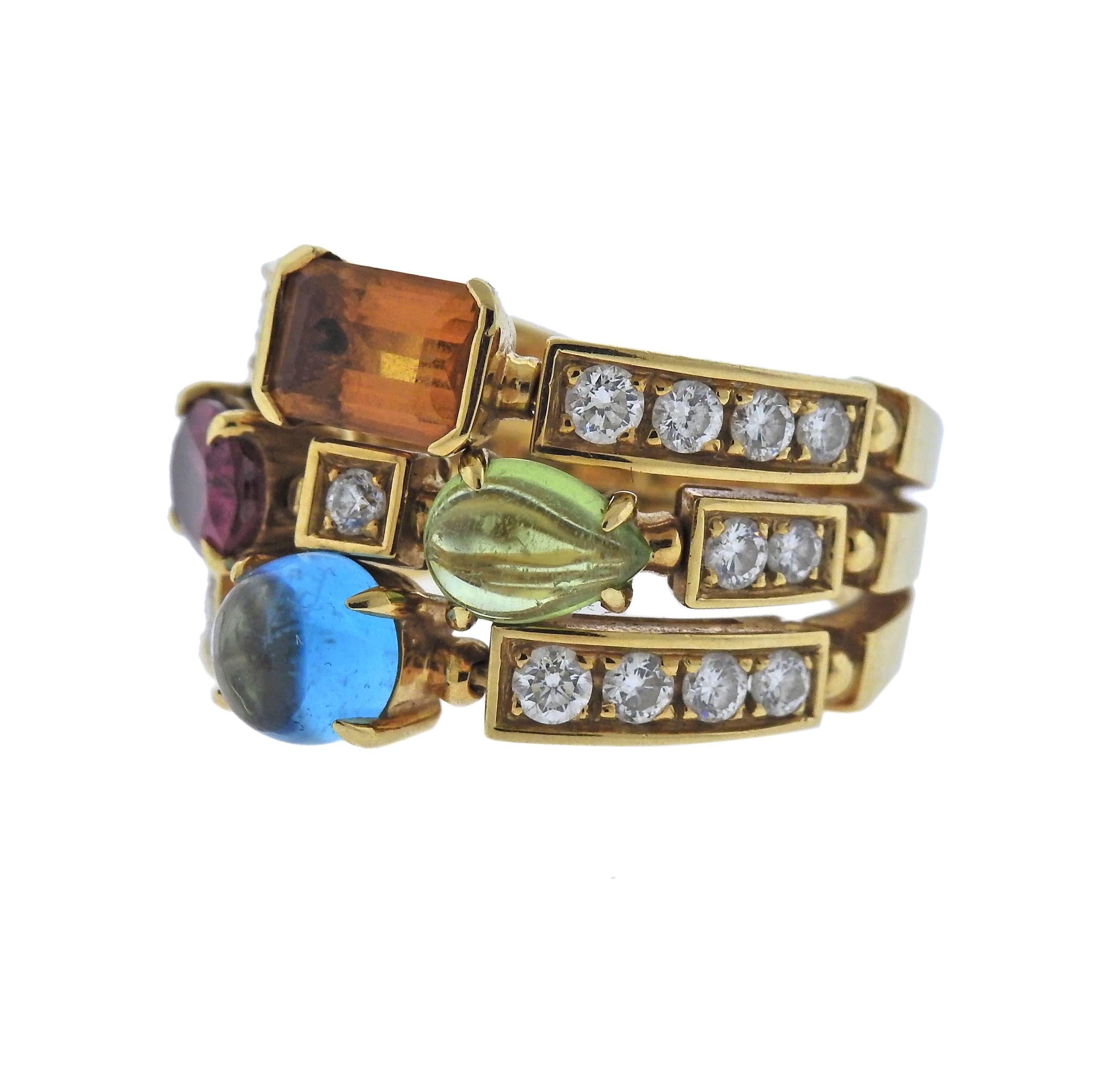 18k yellow gold Allegra ring by Bulgari, set with approx. 0.70ctw in diamonds, peridot, citrine, topaz and tourmaline gemstones. Ring size - 6 1/2, ring top is 17mm wide, weighs 12.4 grams.