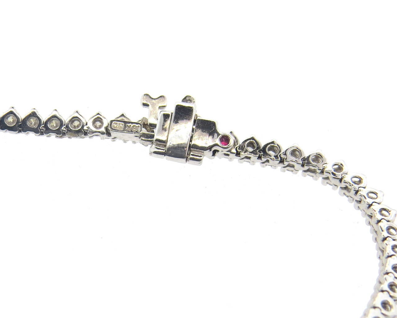 Beautiful 18k white gold necklace by Roberto Coin, featuring approximately 10ctw in graduated diamonds. Necklace is 16 2/8