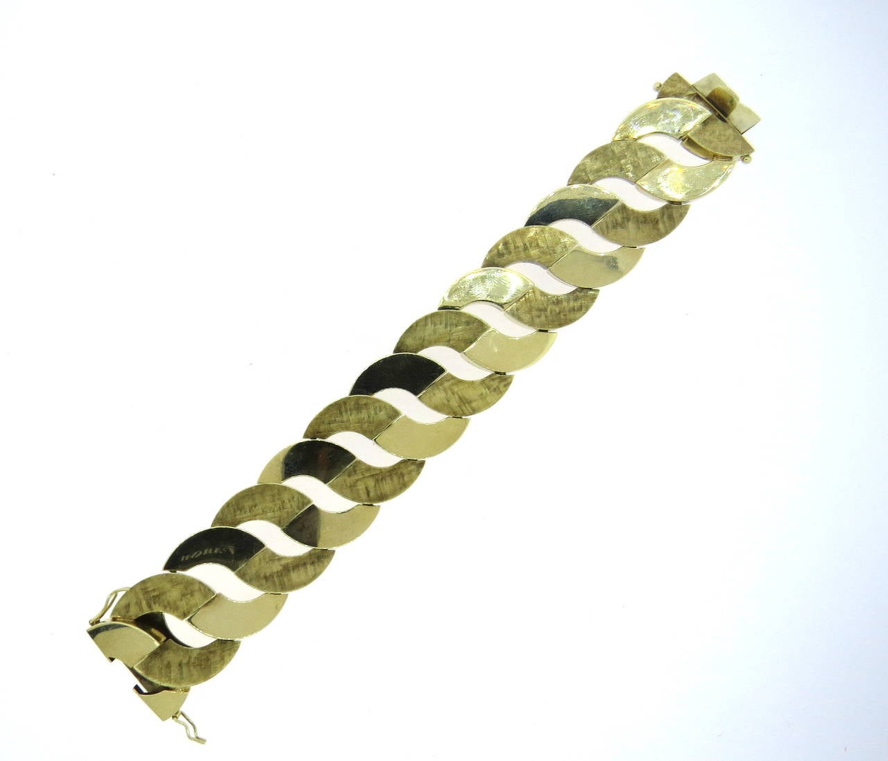 Large 1960s bracelet, crafted in 14k alternating high polish and brushed finish gold. Bracelet is 7 1/8